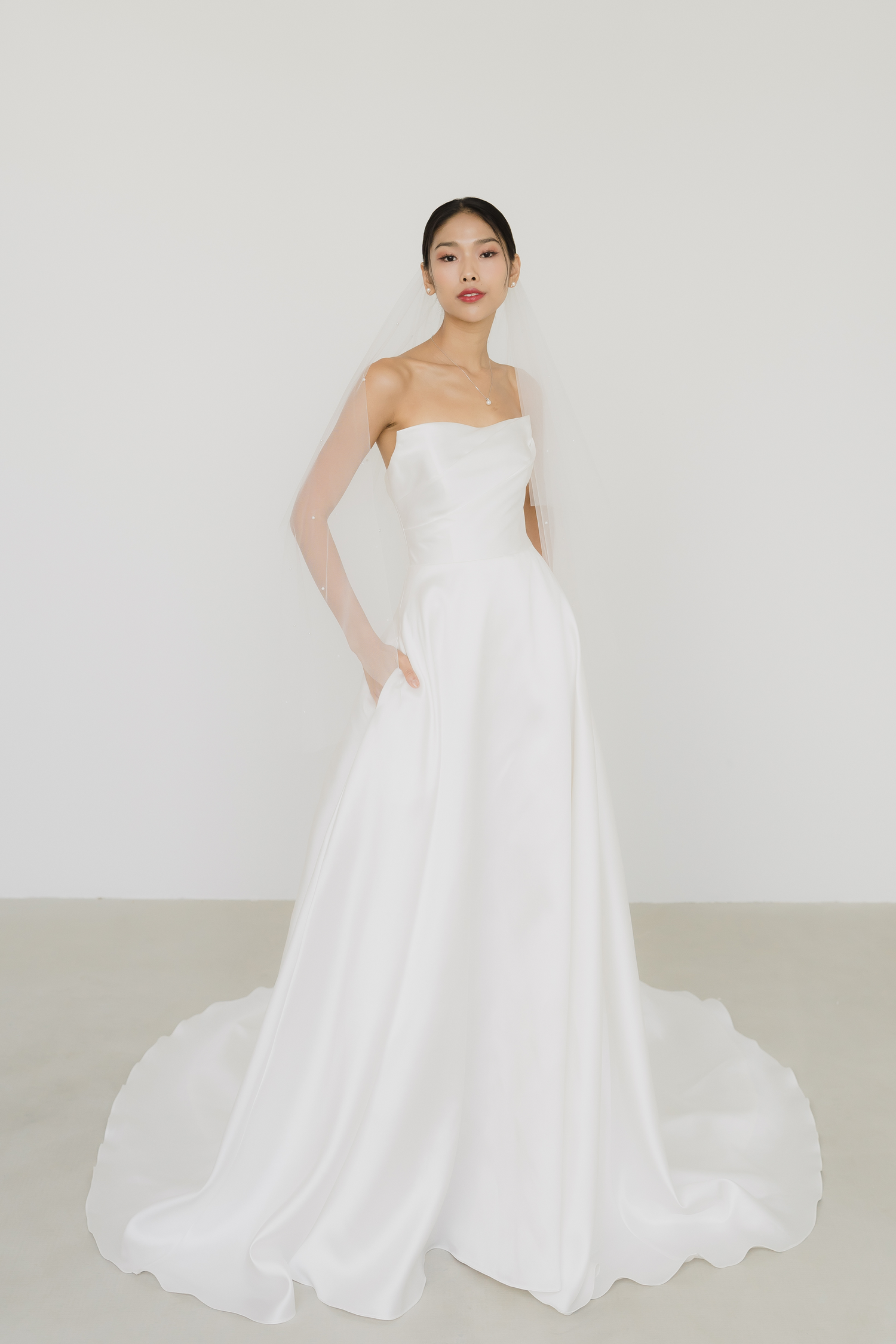 Kendra bridal gown front view with a structured bodice and elegant A-line silhouette