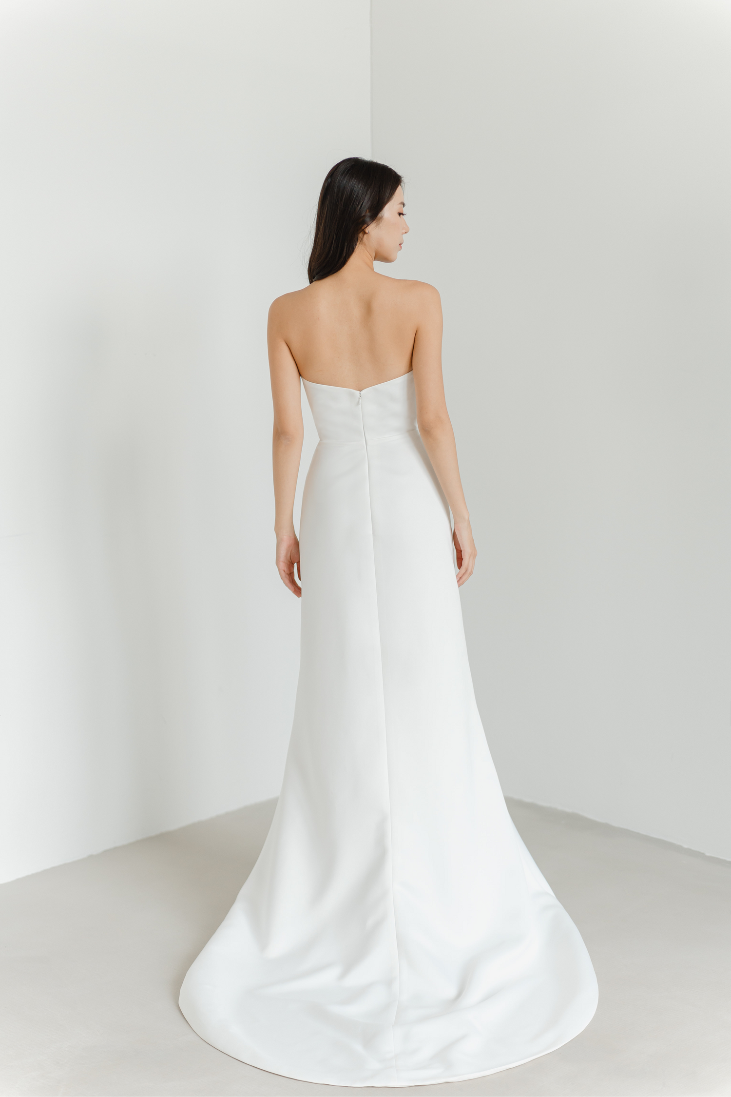 Kirby bridal gown back view with an elegant minimalist design