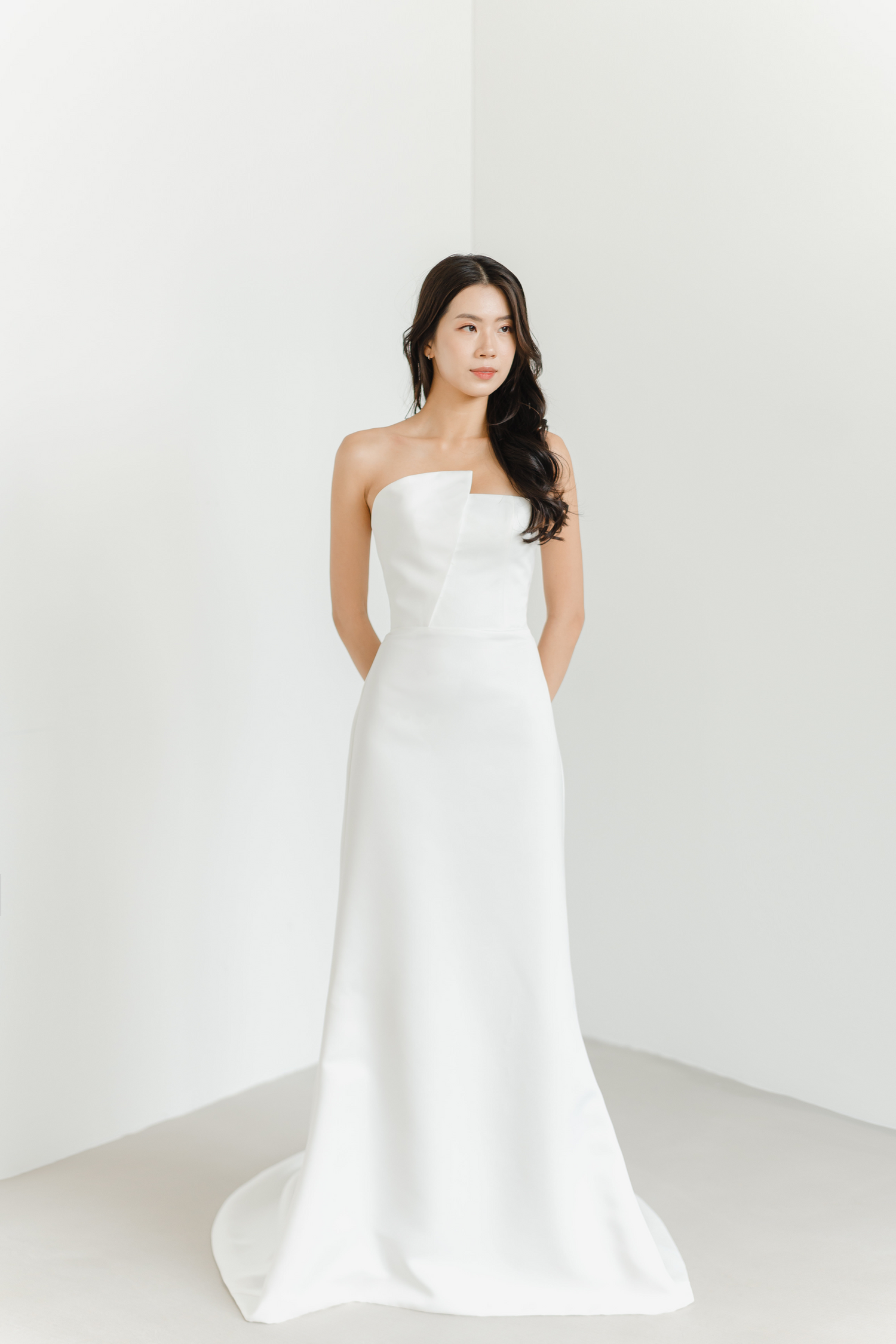 Kirby bridal gown featuring clean lines and structured tailoring