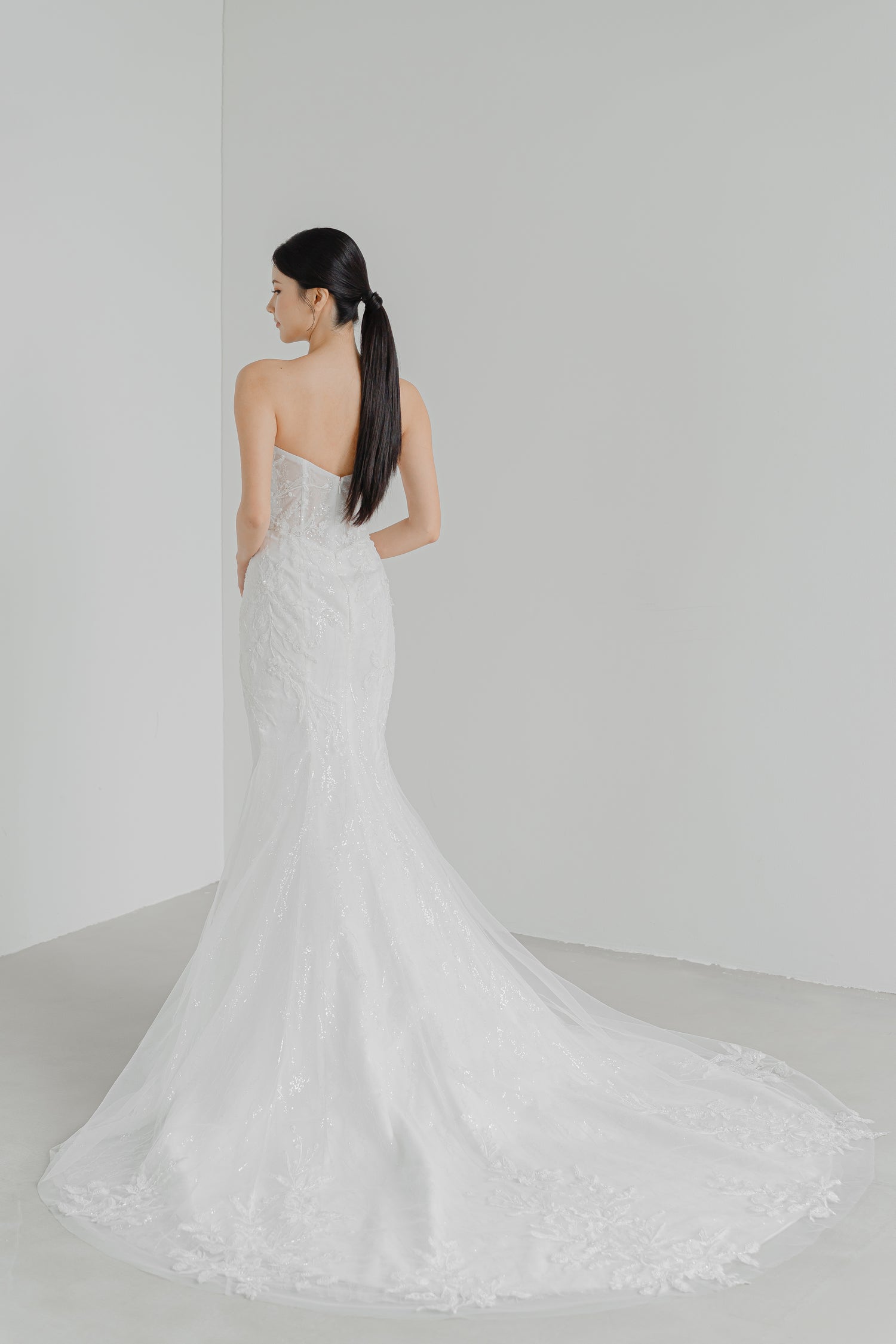 Kylie bridal gown train showcasing the dramatic lace and beaded statement train