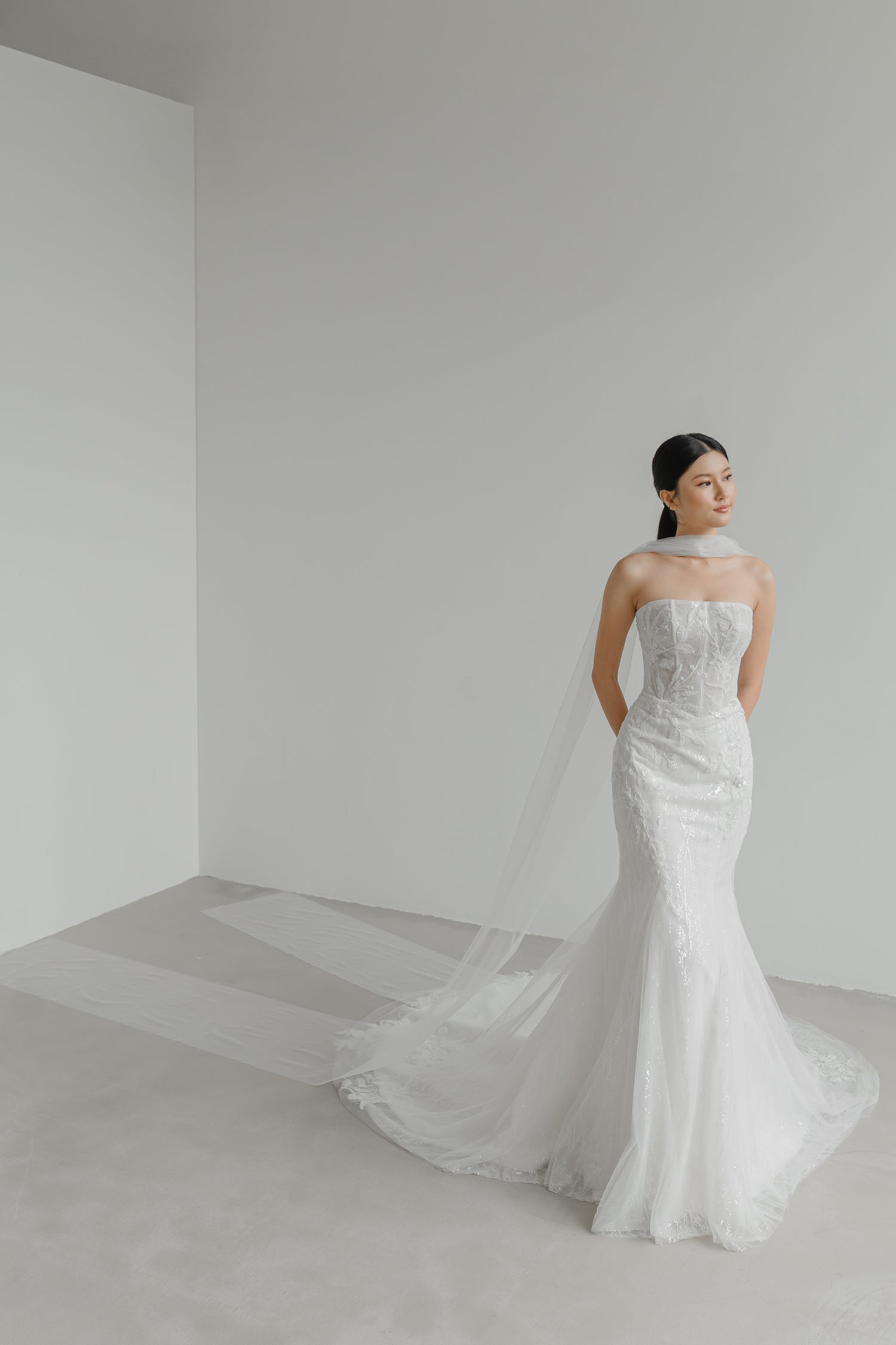 Close-up of Kylie wedding dress highlighting the intricate lace and shimmering beadwork