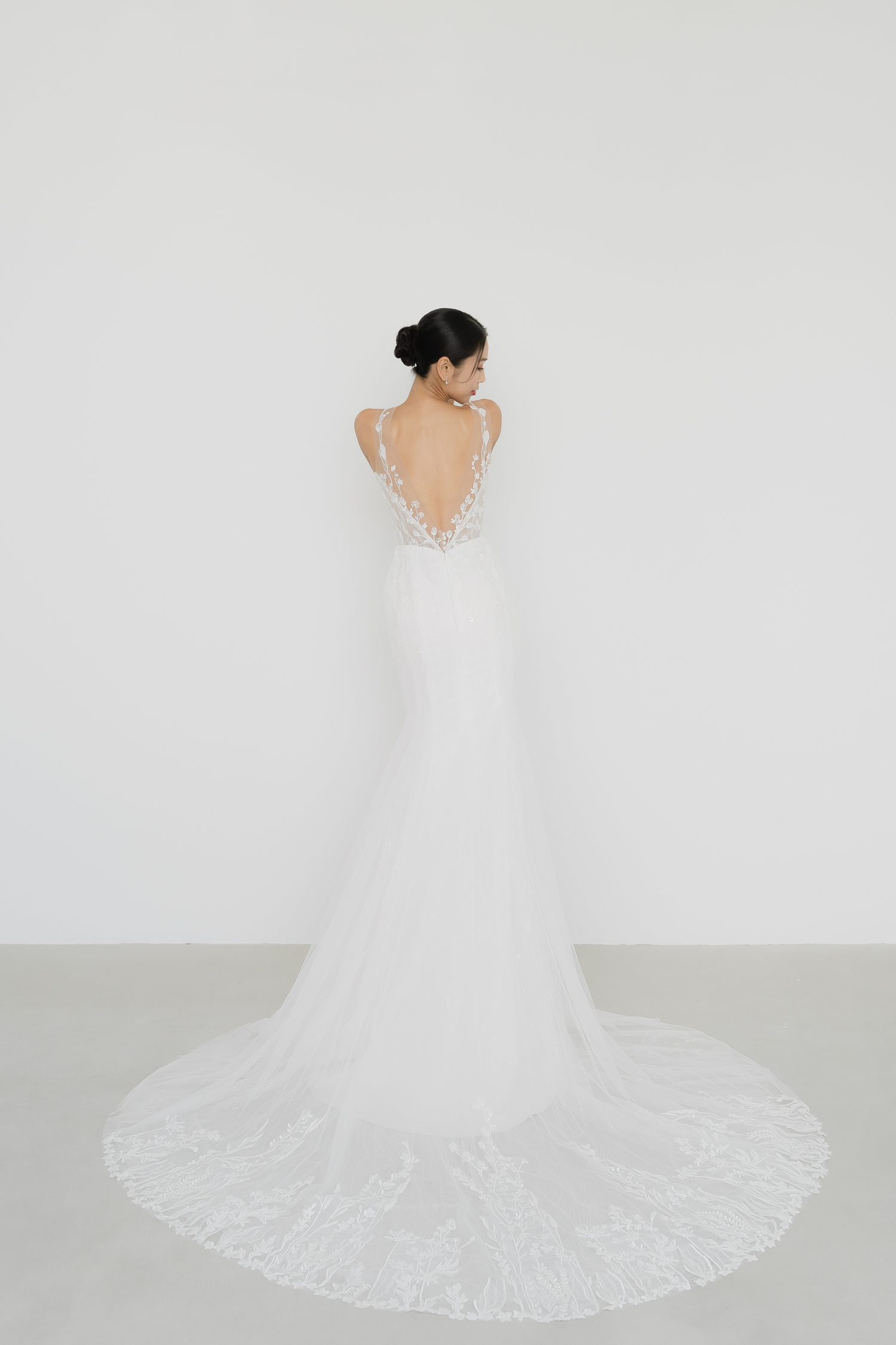 Leia bridal gown train showcasing the dramatic full lace train