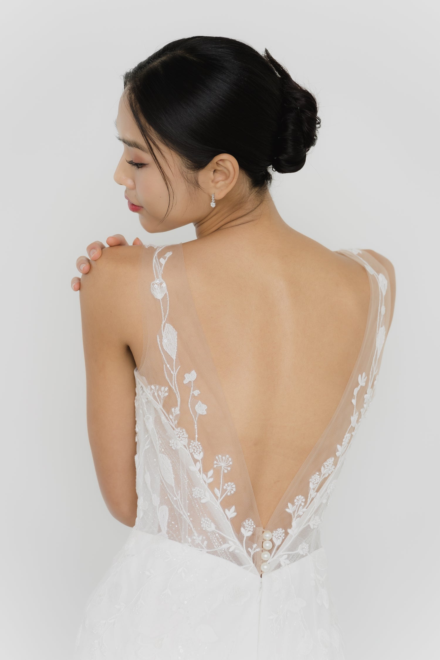 Leia wedding dress back view with a graceful low V-back