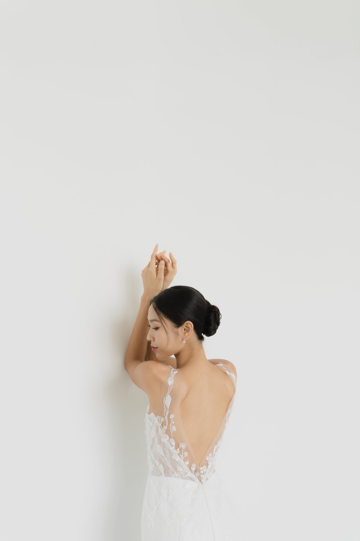 Close-up of Leia wedding gown highlighting the elegant low V-back