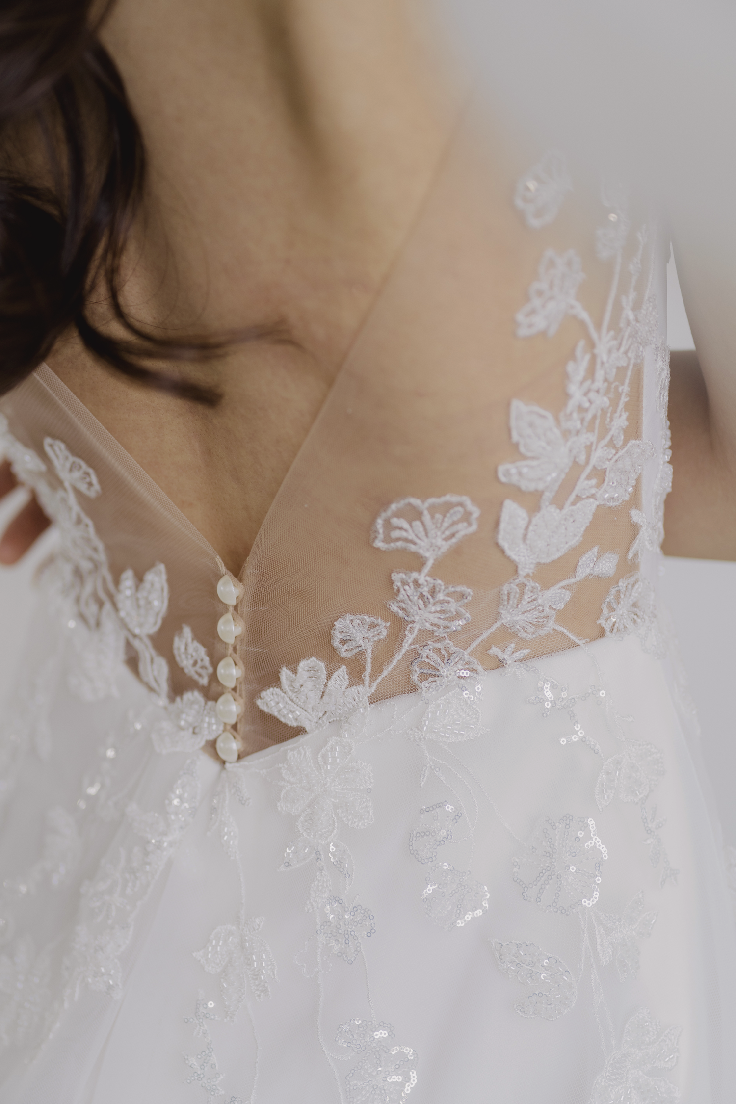 Lexi bridal gown back view with a graceful low back