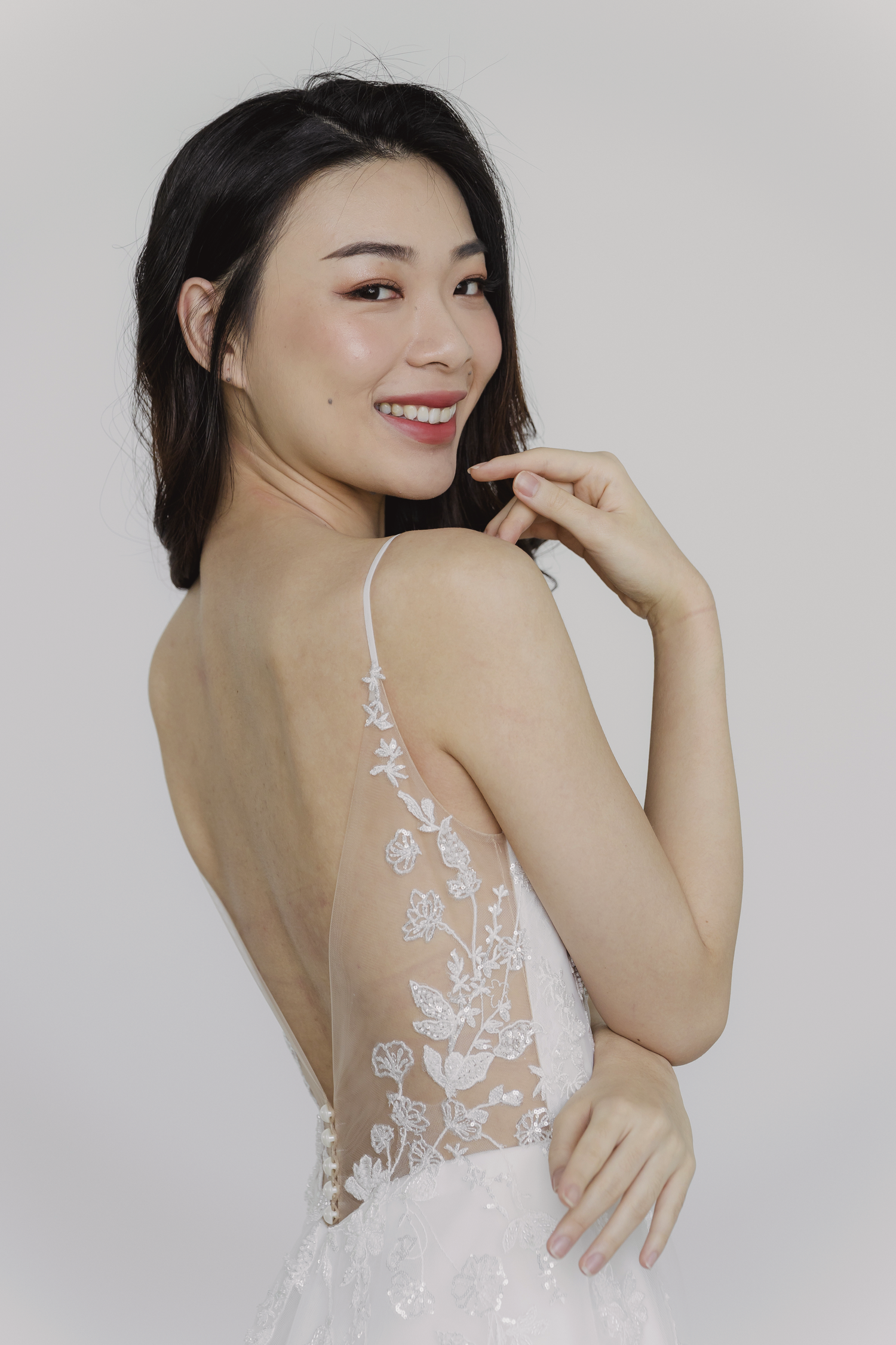 Lexi wedding gown back view with delicate spaghetti straps