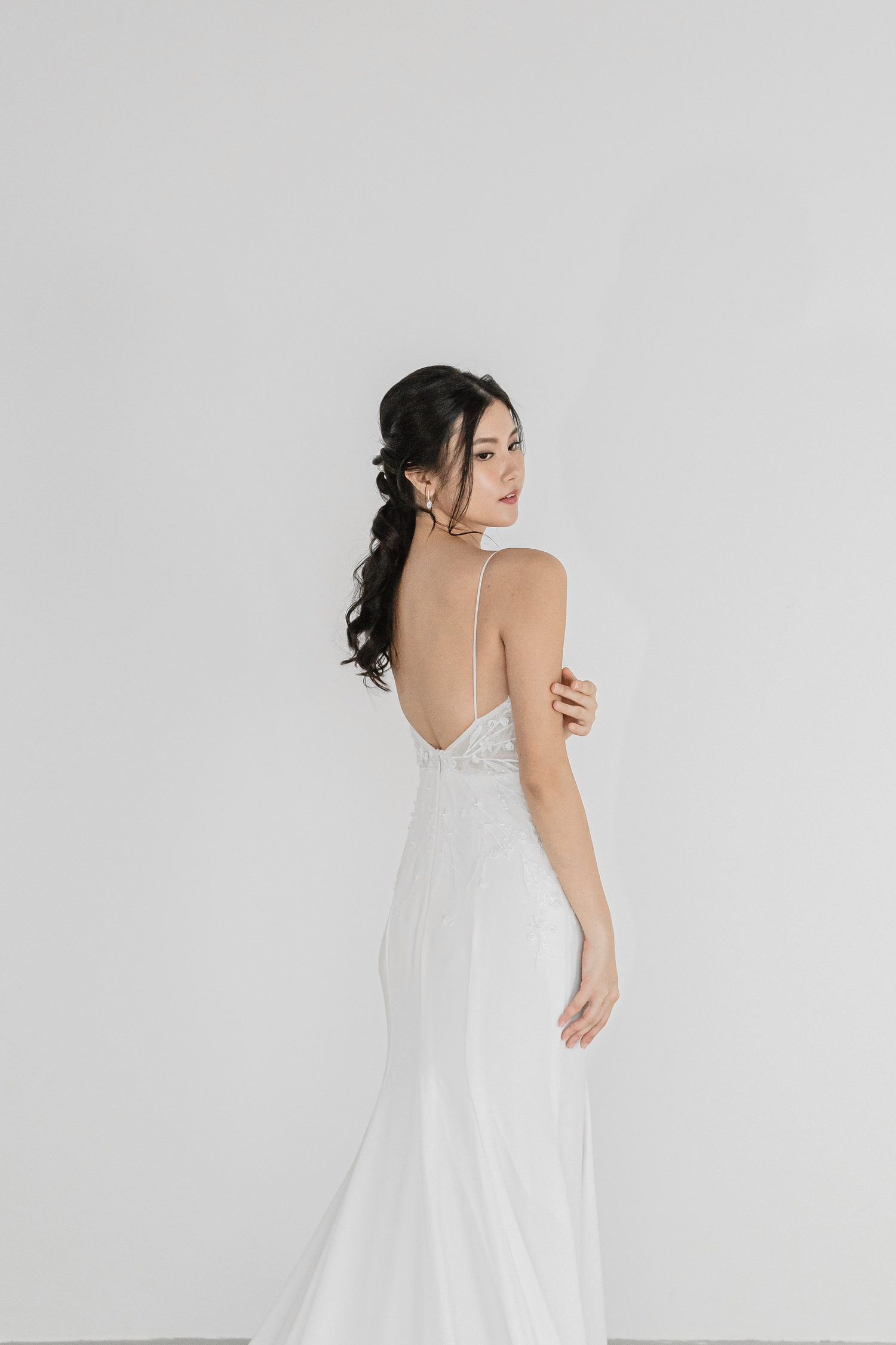Liyana wedding gown back view with an elegant fitted silhouette
