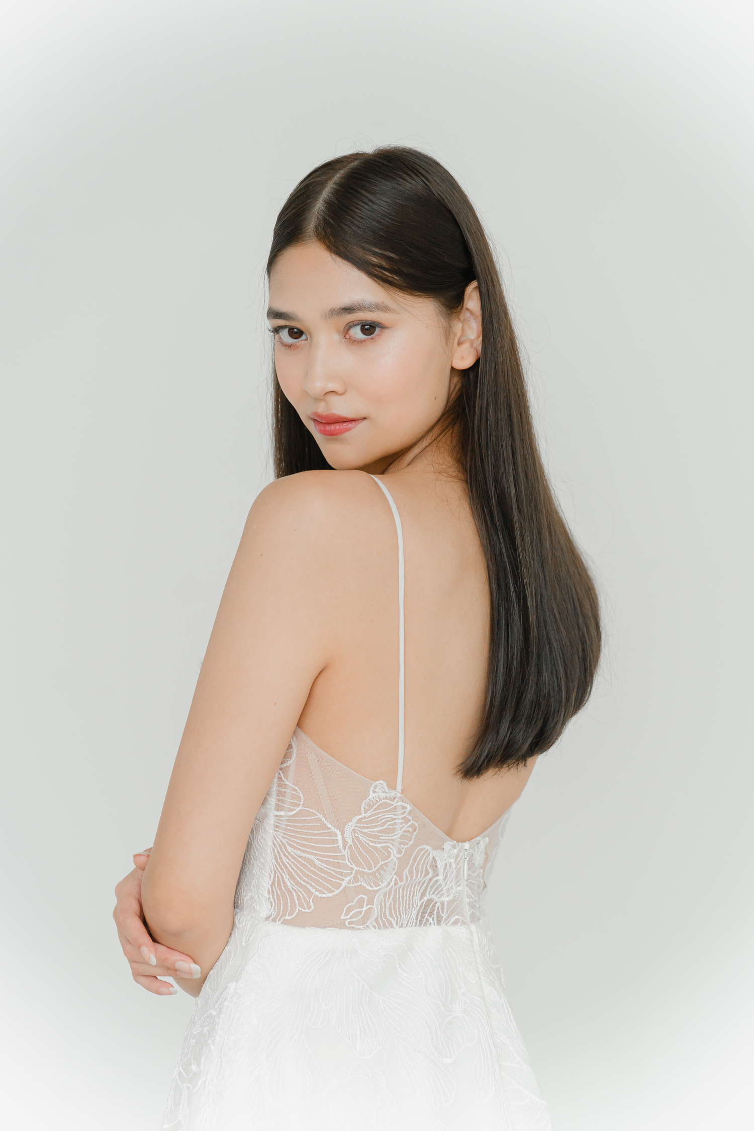 Close-up of Lola wedding dress with delicate floral lace detailing