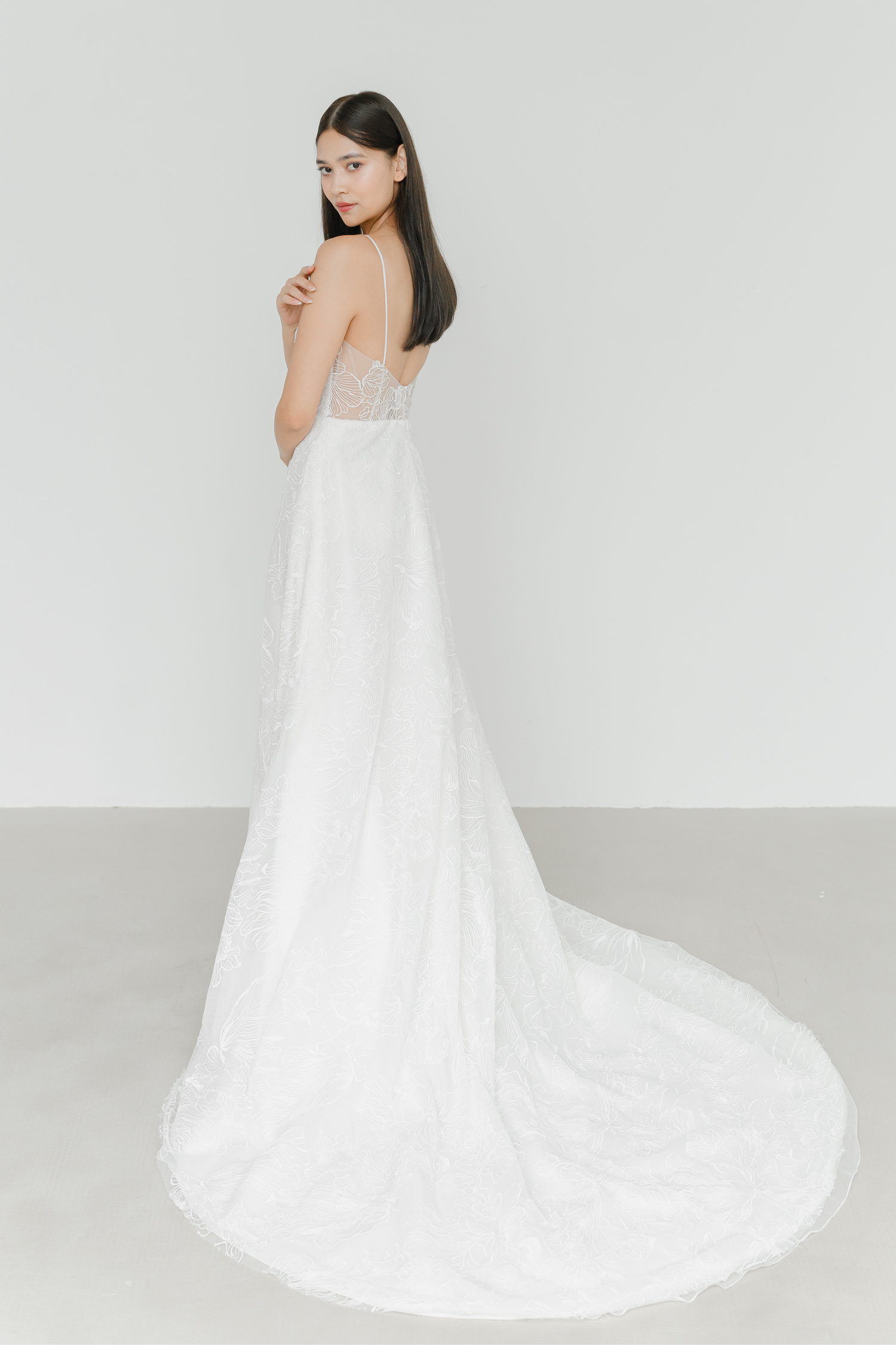 Lola bridal gown side view with a romantic A-line silhouette