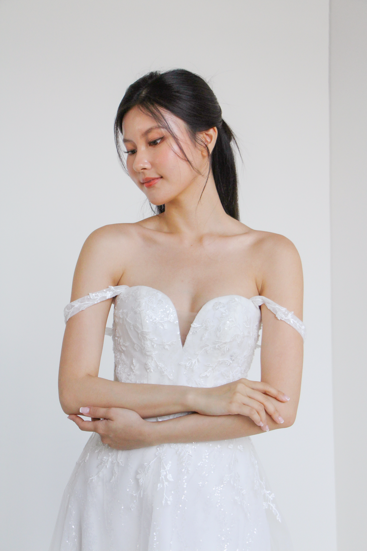 Lynette wedding dress worn with detachable straps on the shoulders