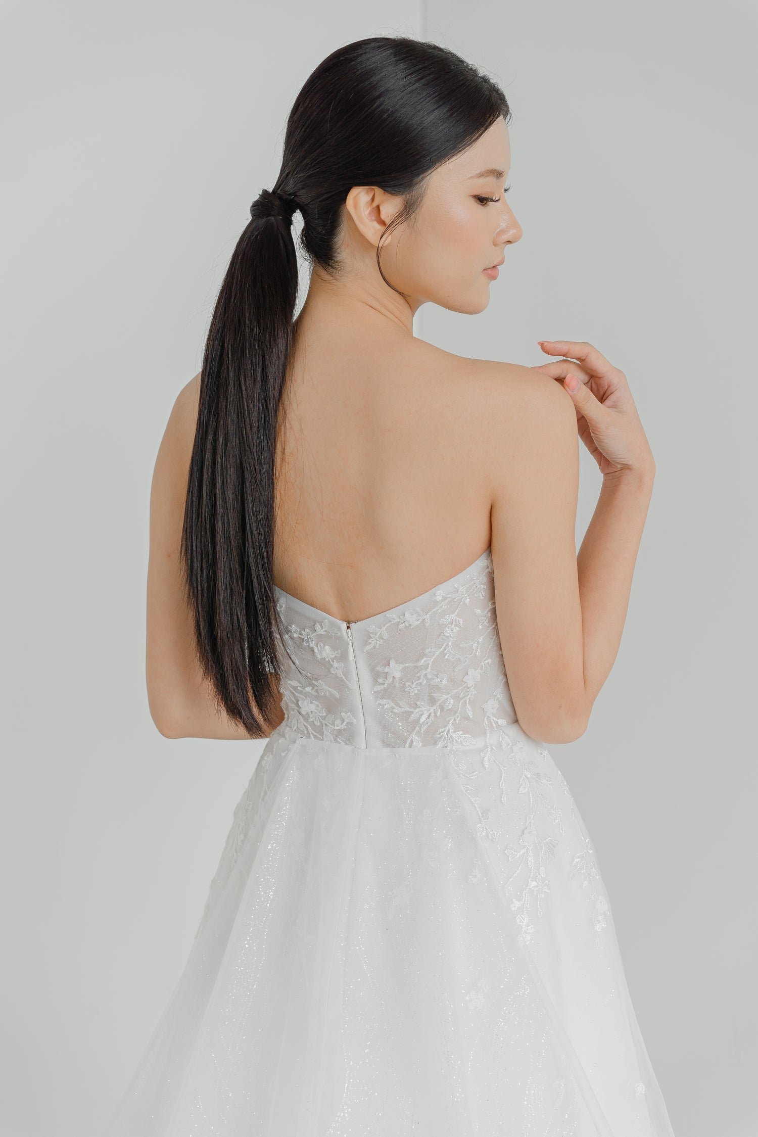 Madelyn wedding dress back view with an elegant fitted bodice