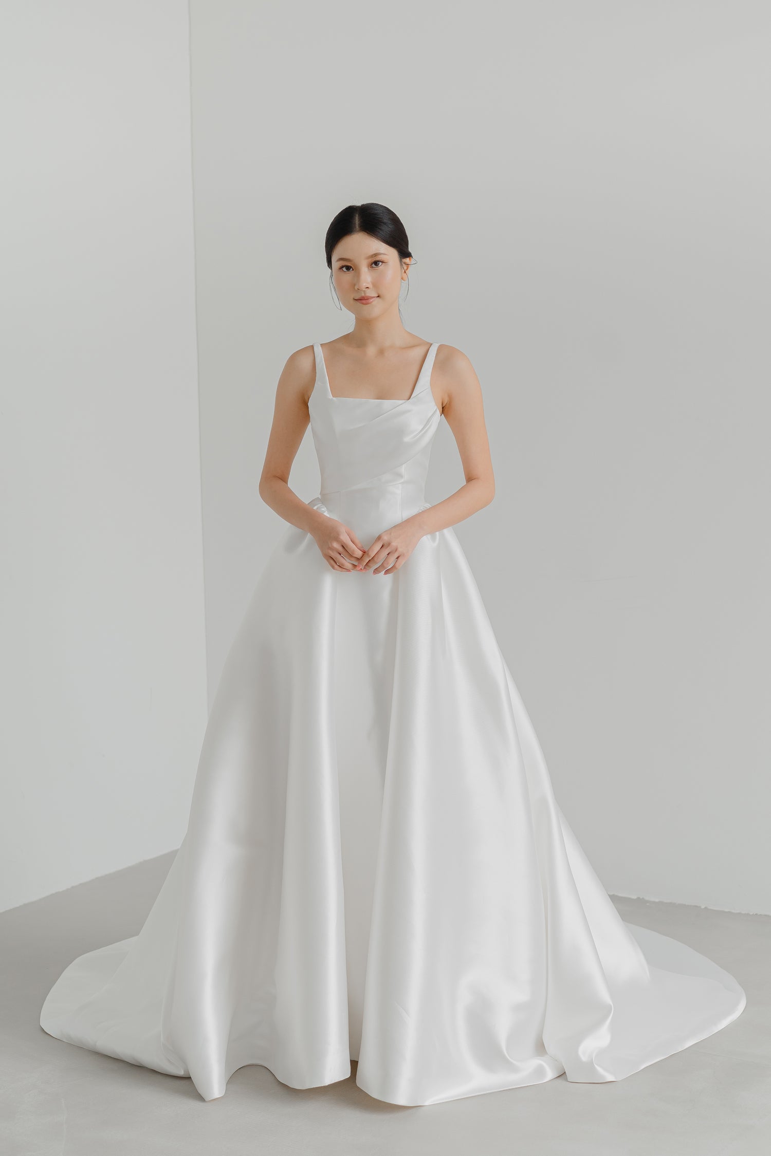 Close-up of Maeve bridal gown showcasing the elegant square neckline
