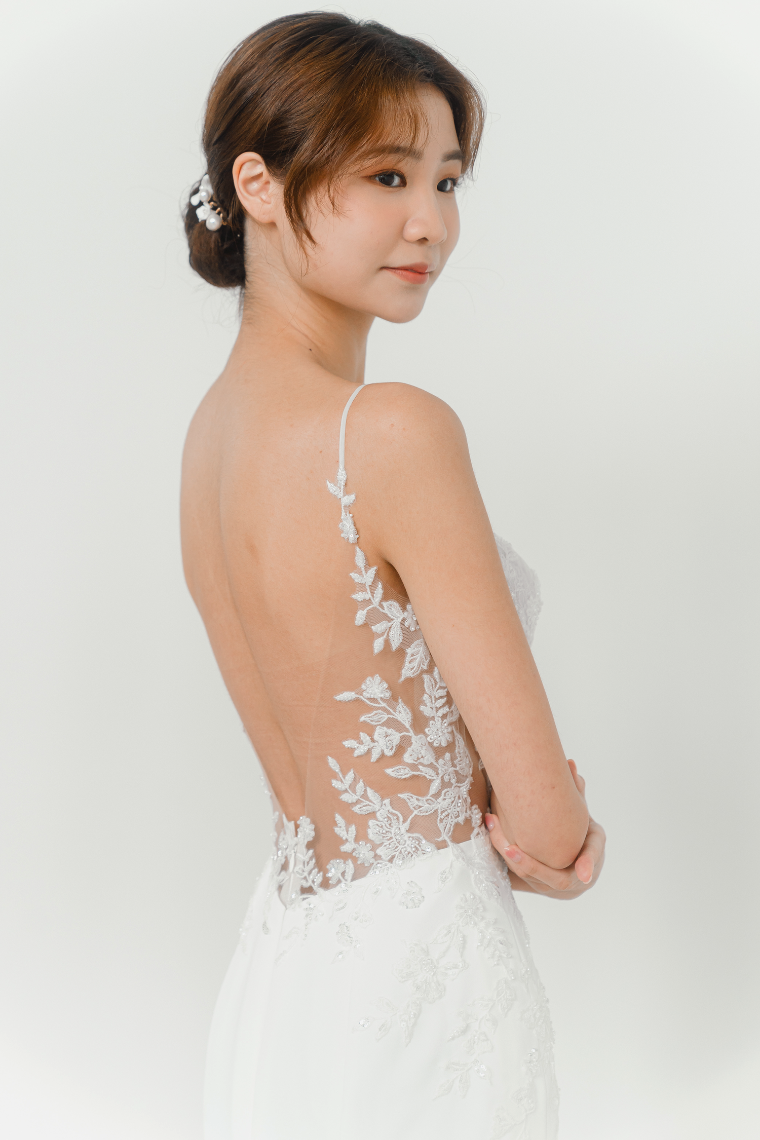 Close-up of Melanie wedding dress showcasing the beaded lace bodice