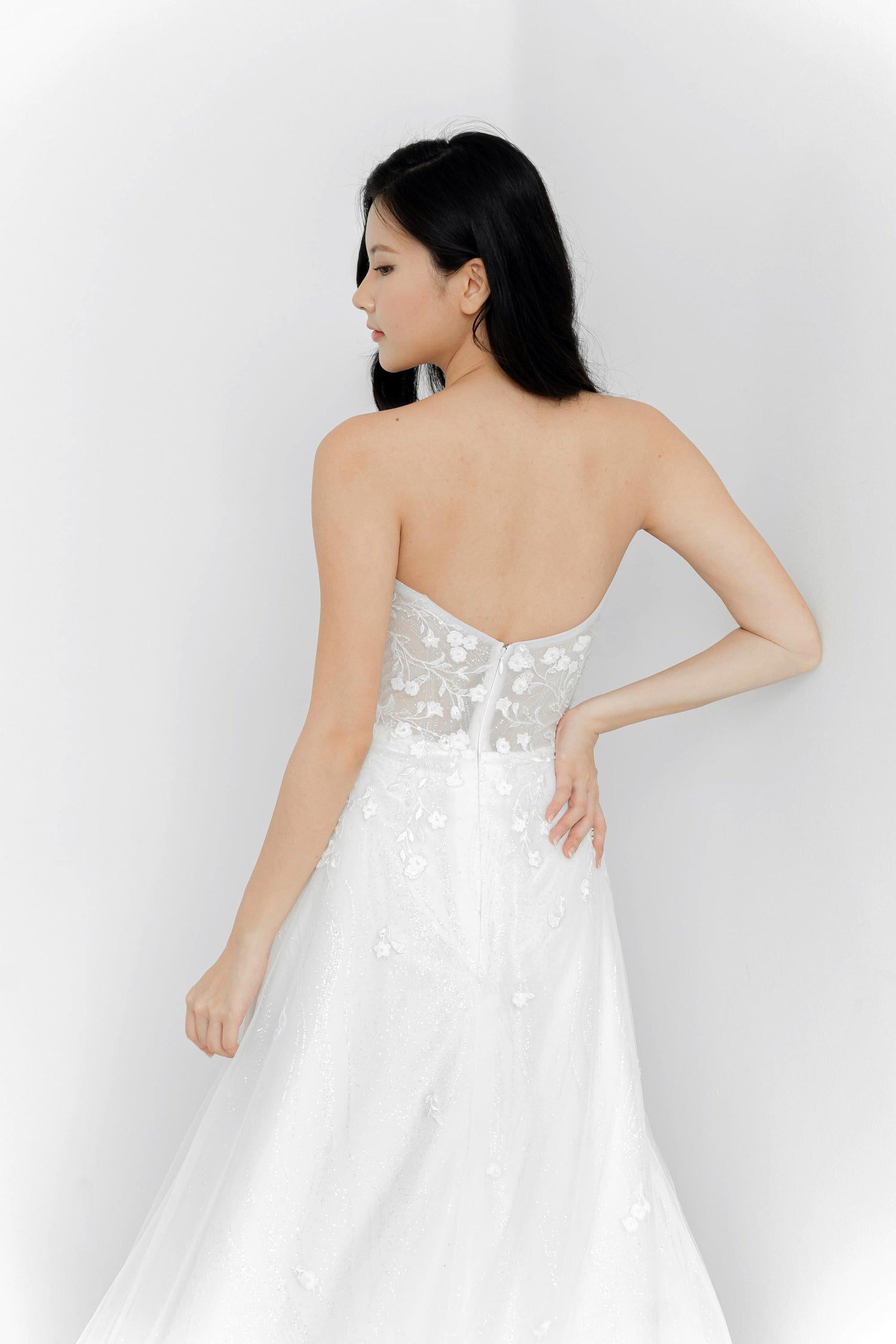 Mirelle wedding dress back view with an elegant flowing silhouette