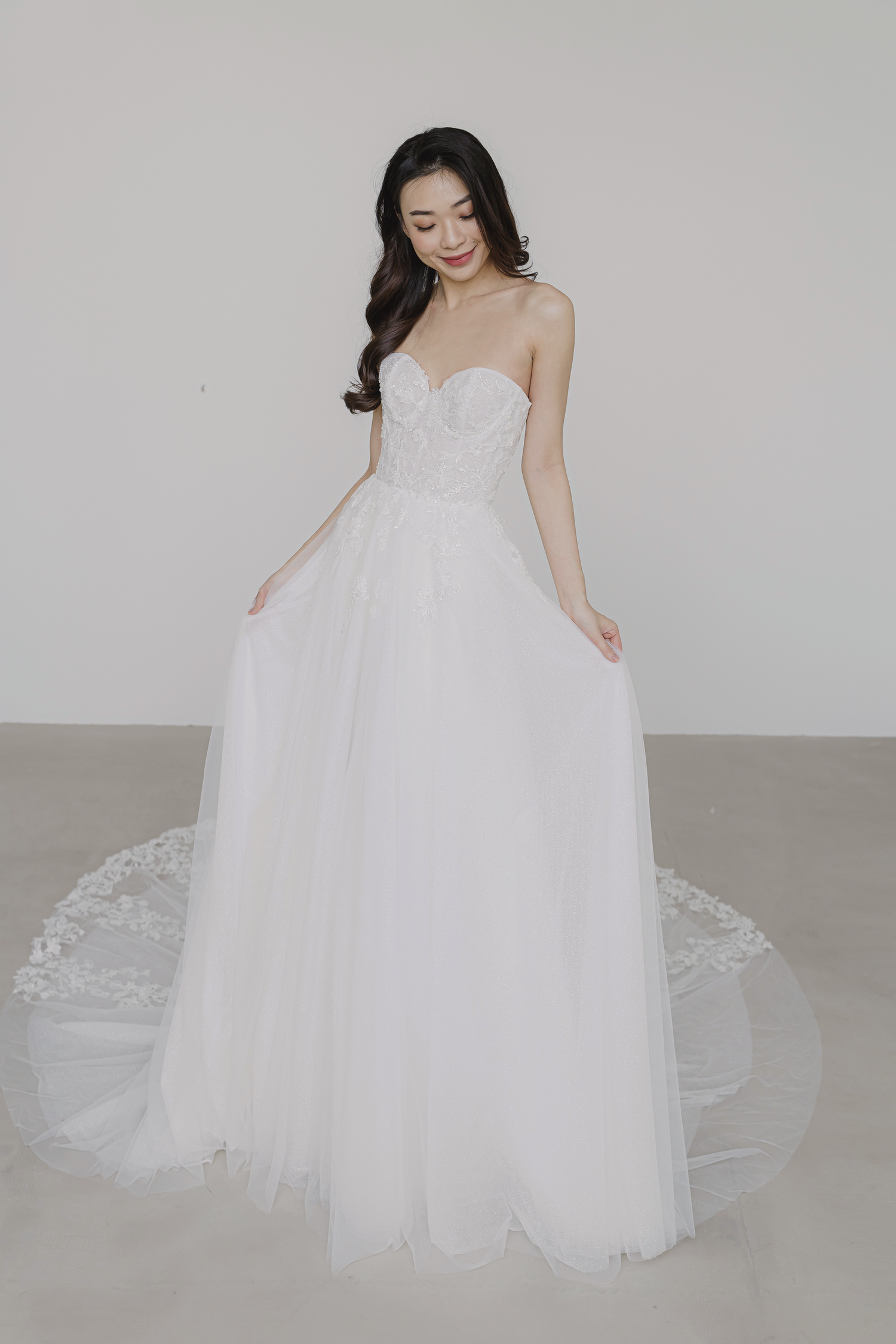 Miriam wedding gown featuring sparkling glitter tulle and intricate beaded lace