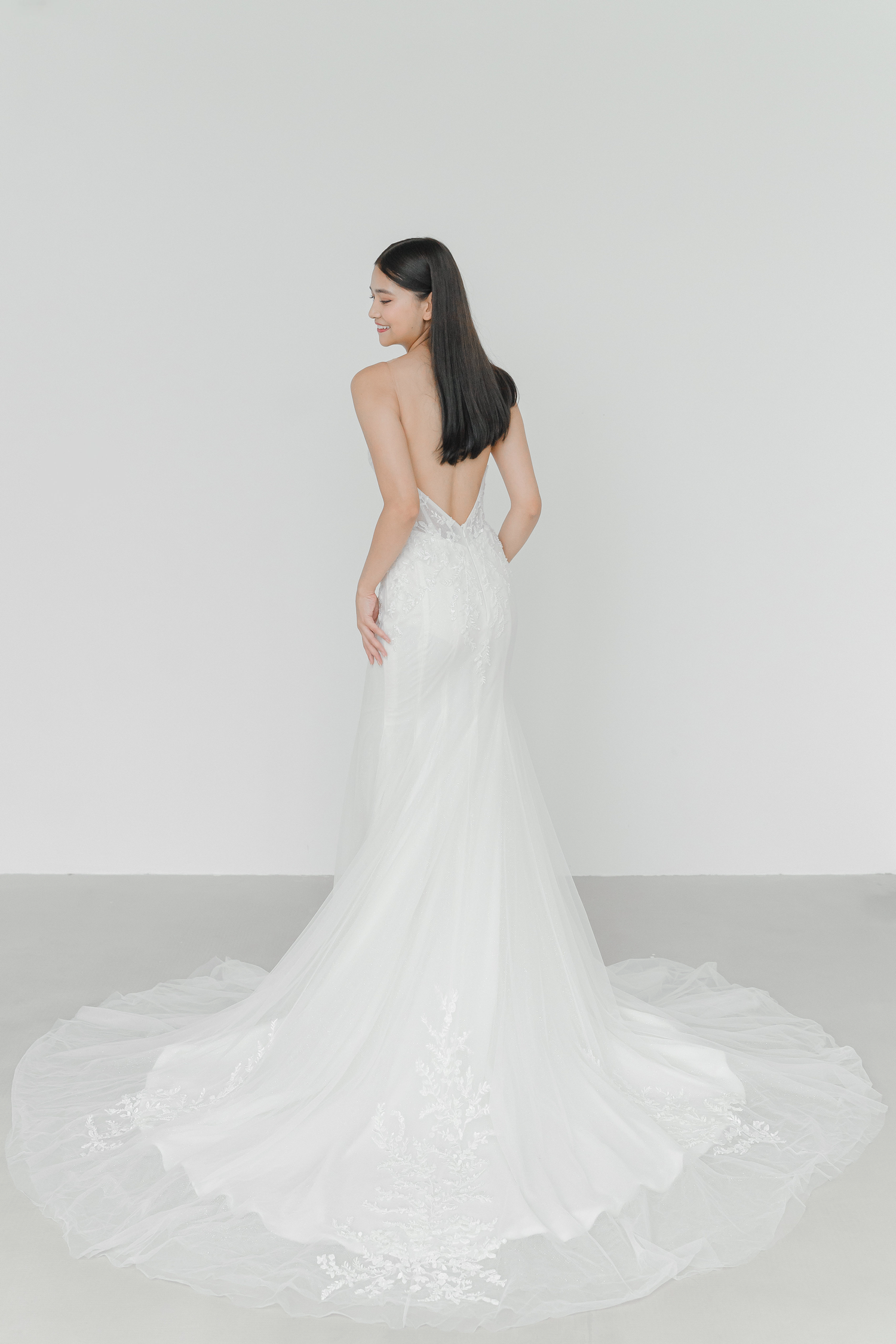 Monica wedding dress back view with an elegant fitted silhouette