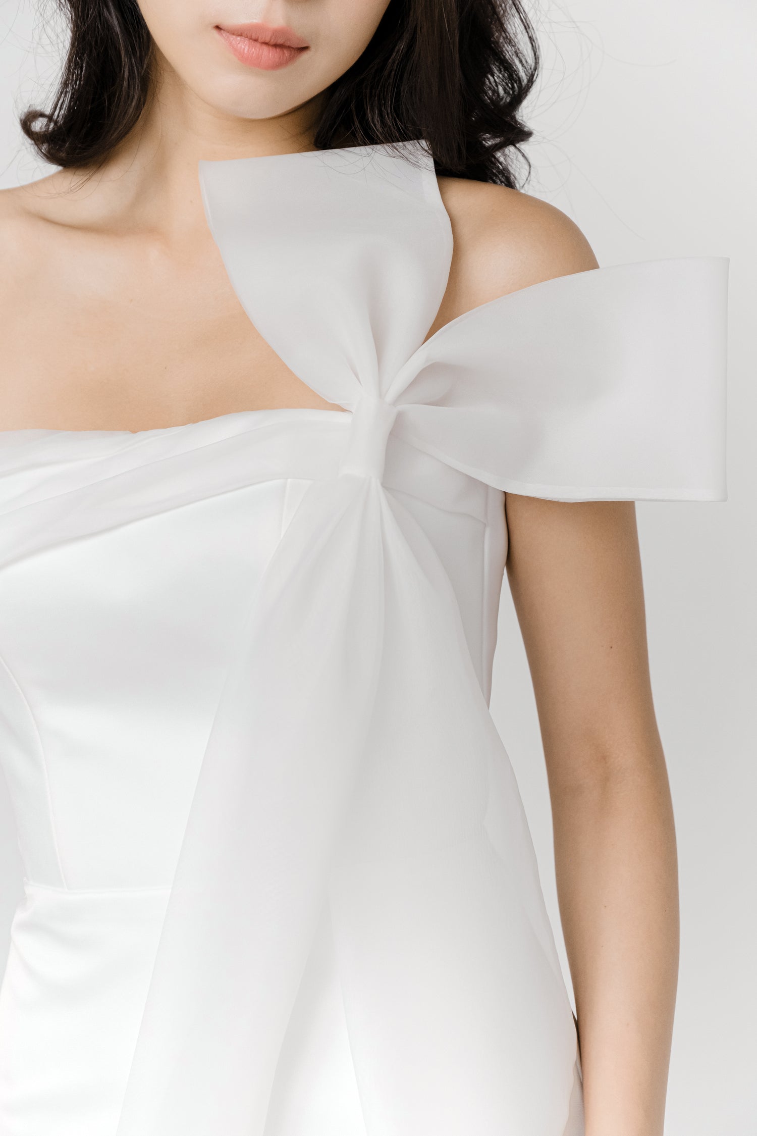 Close-up of Morgan bridal gown showcasing the detachable statement bow