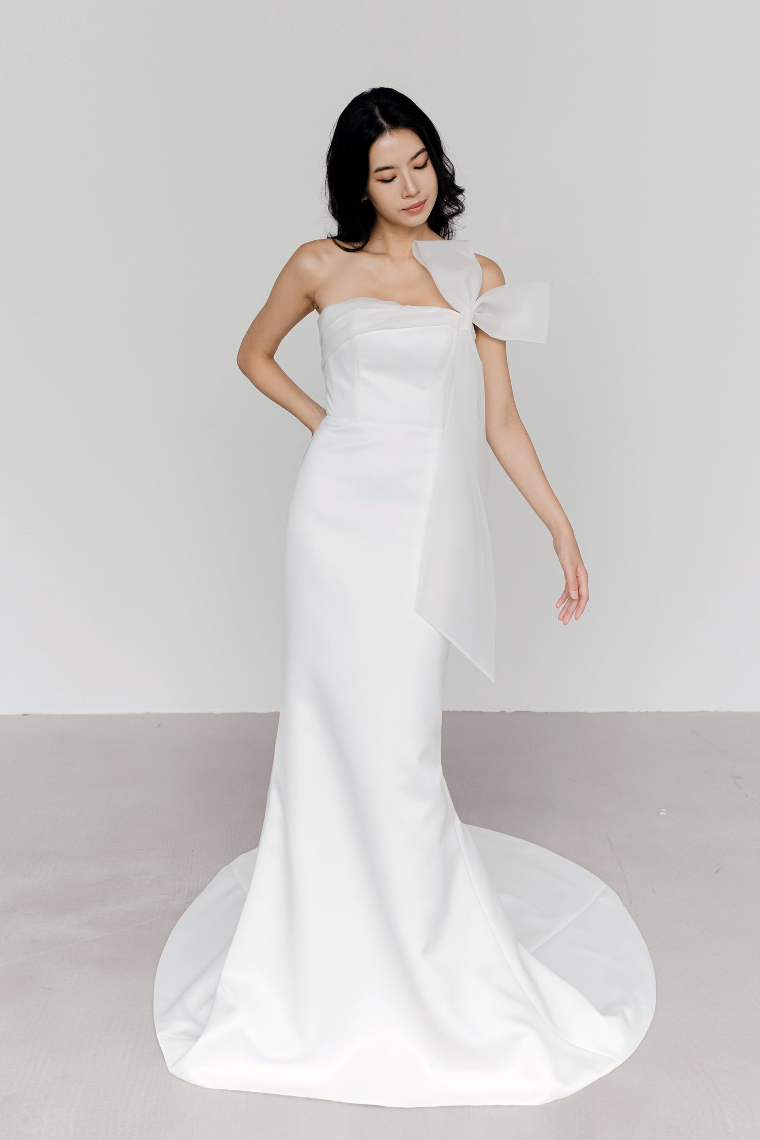 Morgan bridal gown front view with a sleek satin silhouette