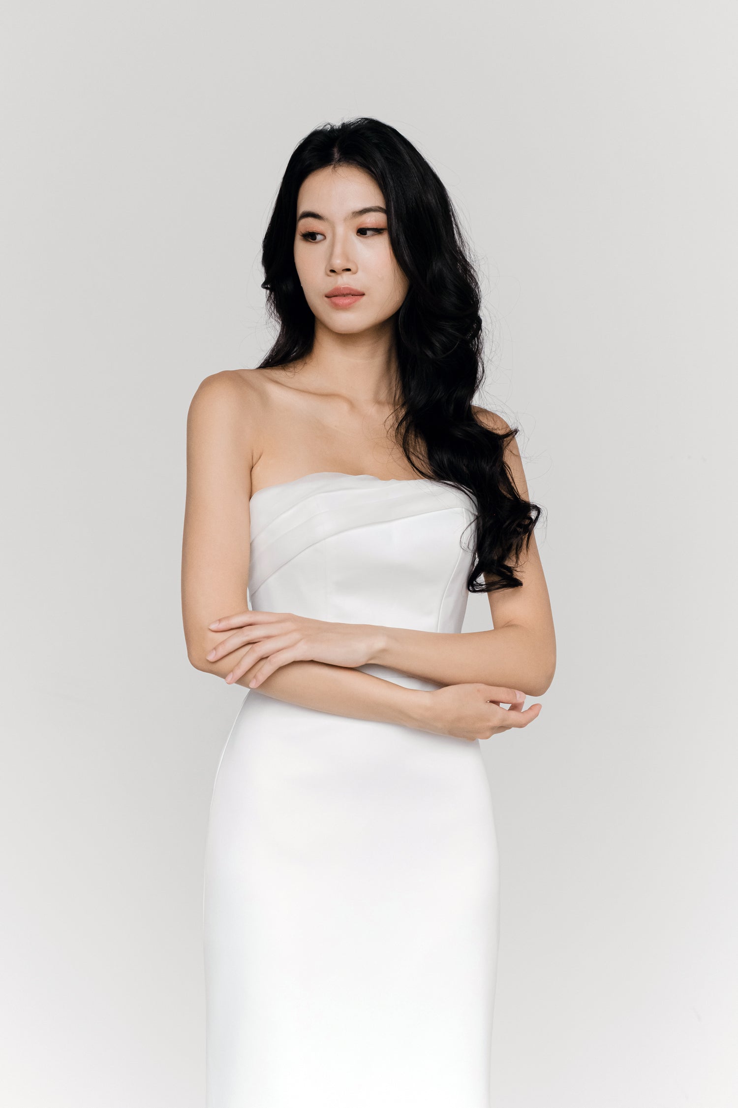 Close-up of Morgan wedding gown highlighting the smooth satin finish