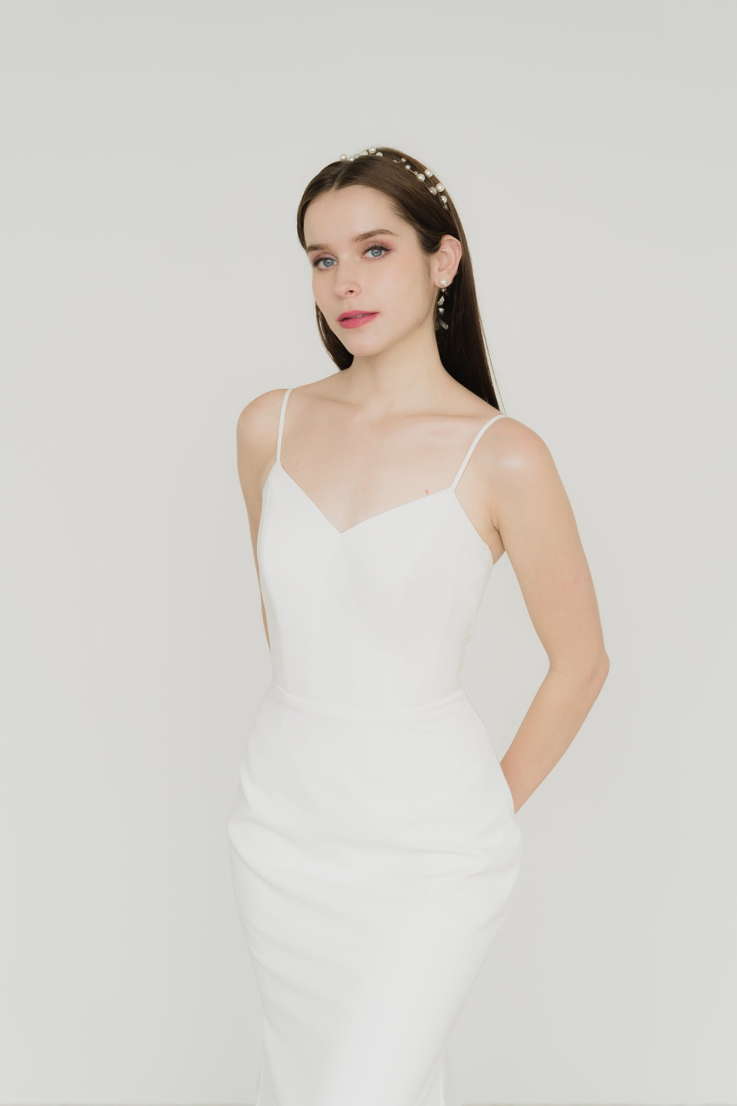 Nadia wedding dress front view with delicate spaghetti straps and a soft V-neckline