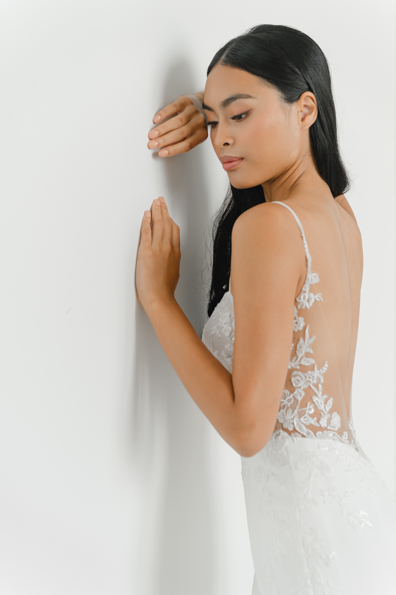 Close-up of Natalie wedding dress with delicate floral lace detailing