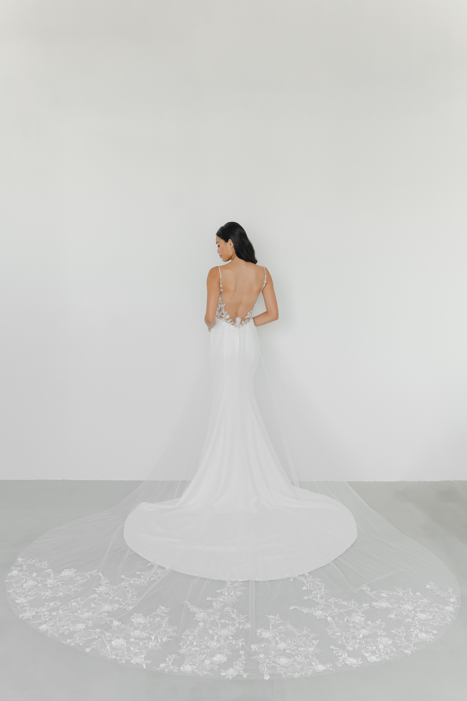 Natalie wedding gown train showcasing intricate lace edging and a romantic flowing train