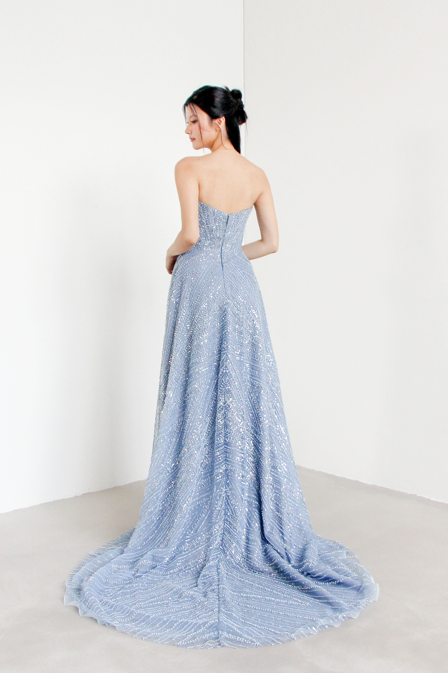 Nova beaded evening gown back view with shimmering beadwork