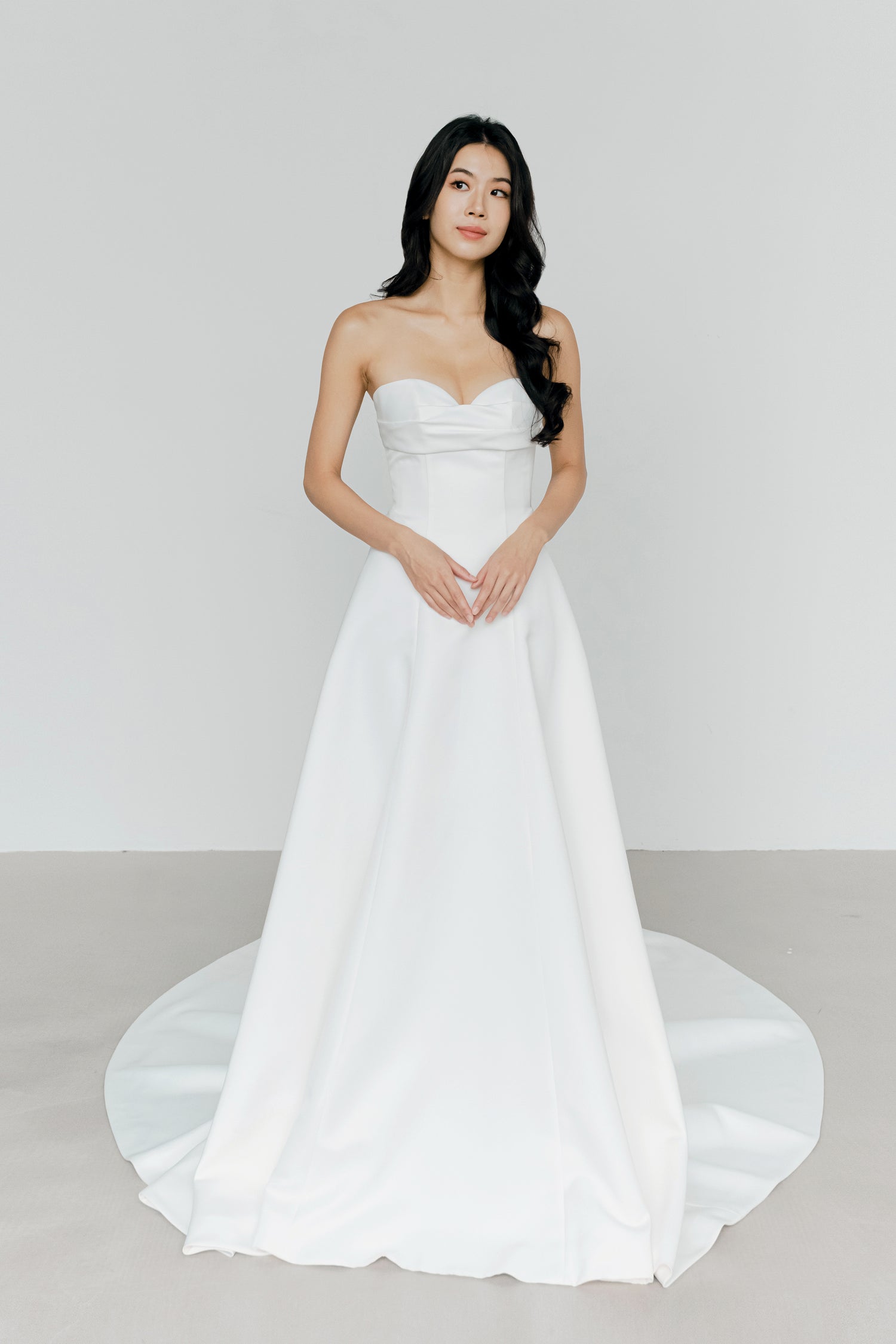 Oakley wedding dress front view with a sweetheart neckline and classic satin A-line silhouette