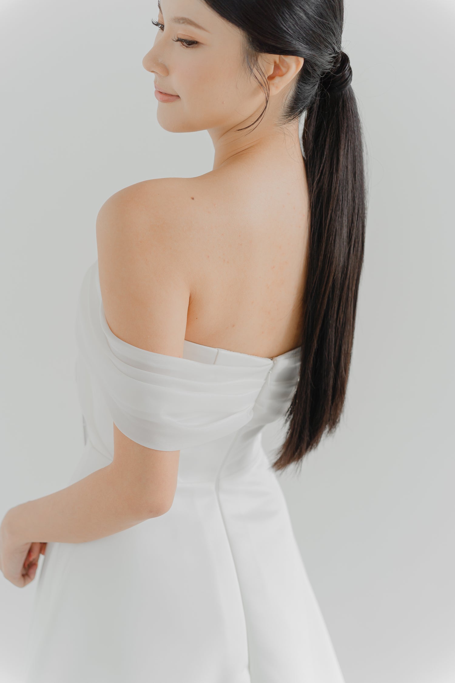 Odena wedding dress back view with a clean minimalist design