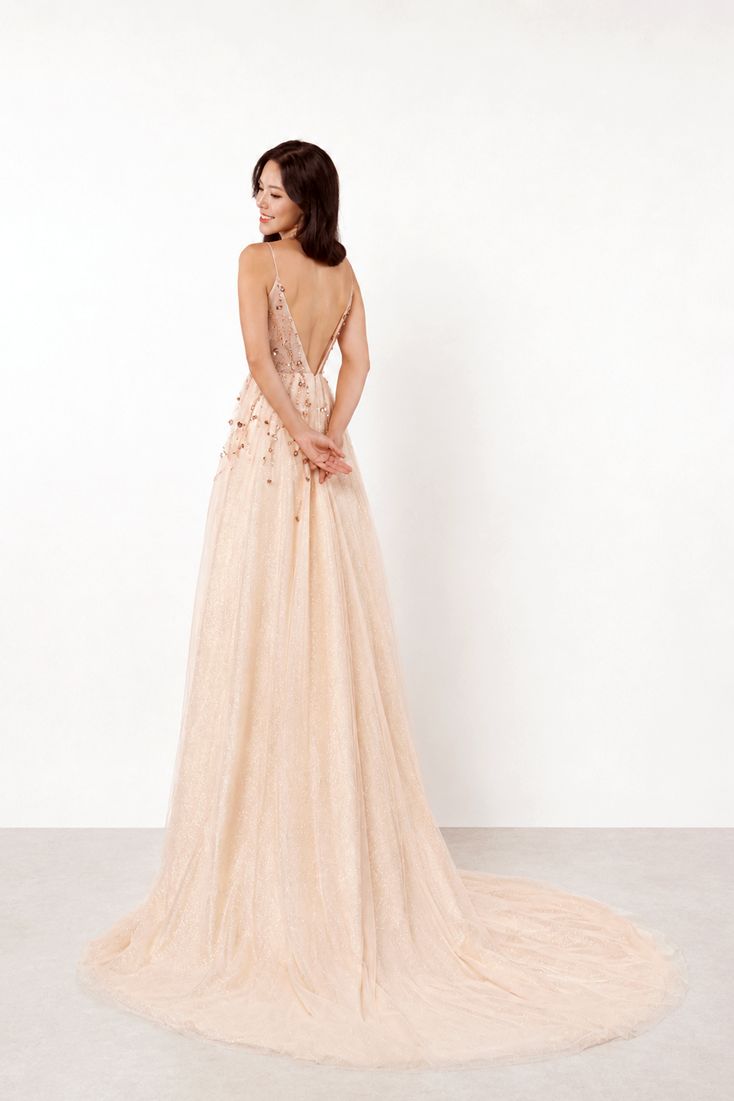 Paige glitter evening gown back view with shimmering sequinned detailing