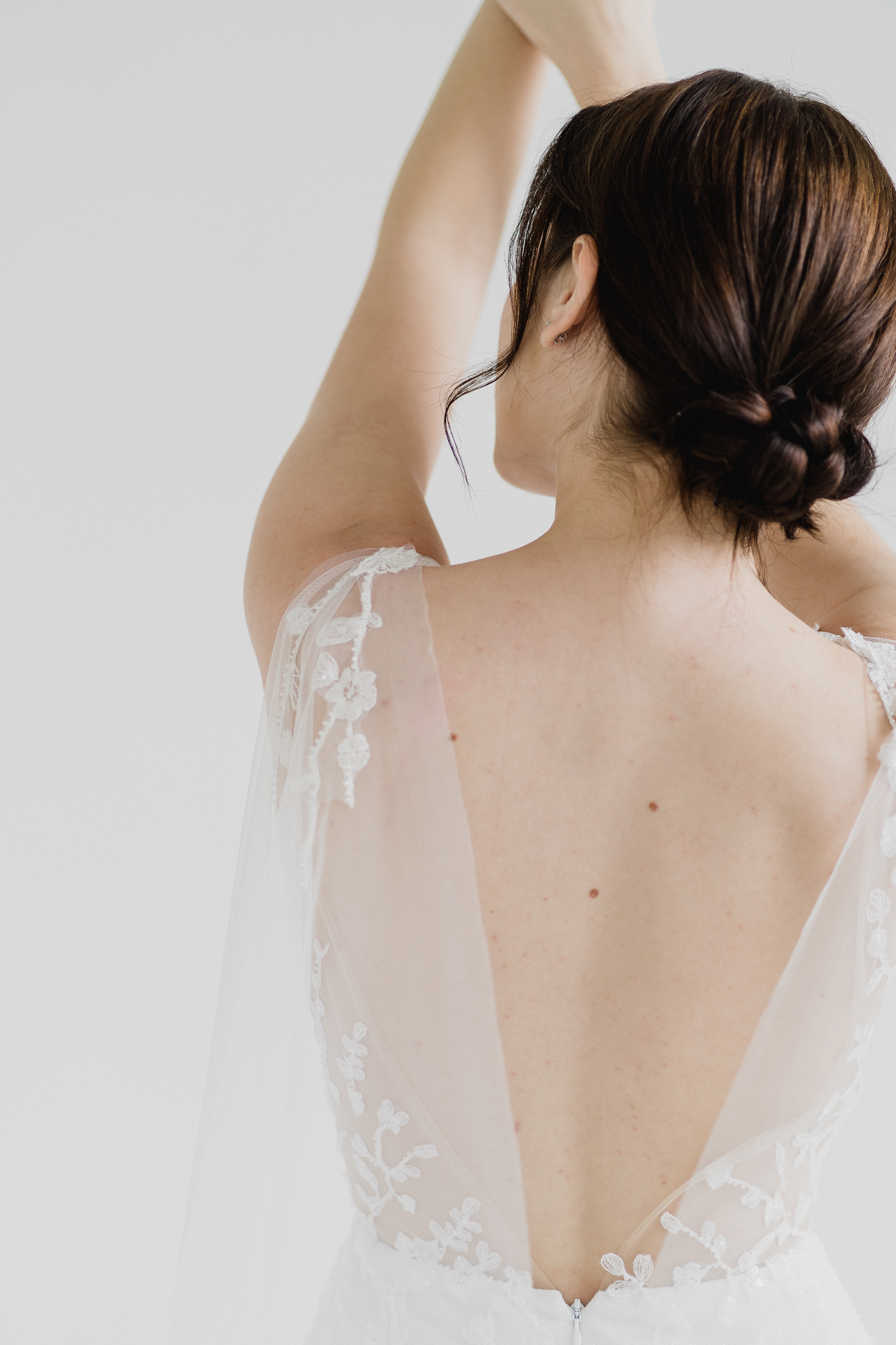 Reimi bridal gown back view with a low V-back