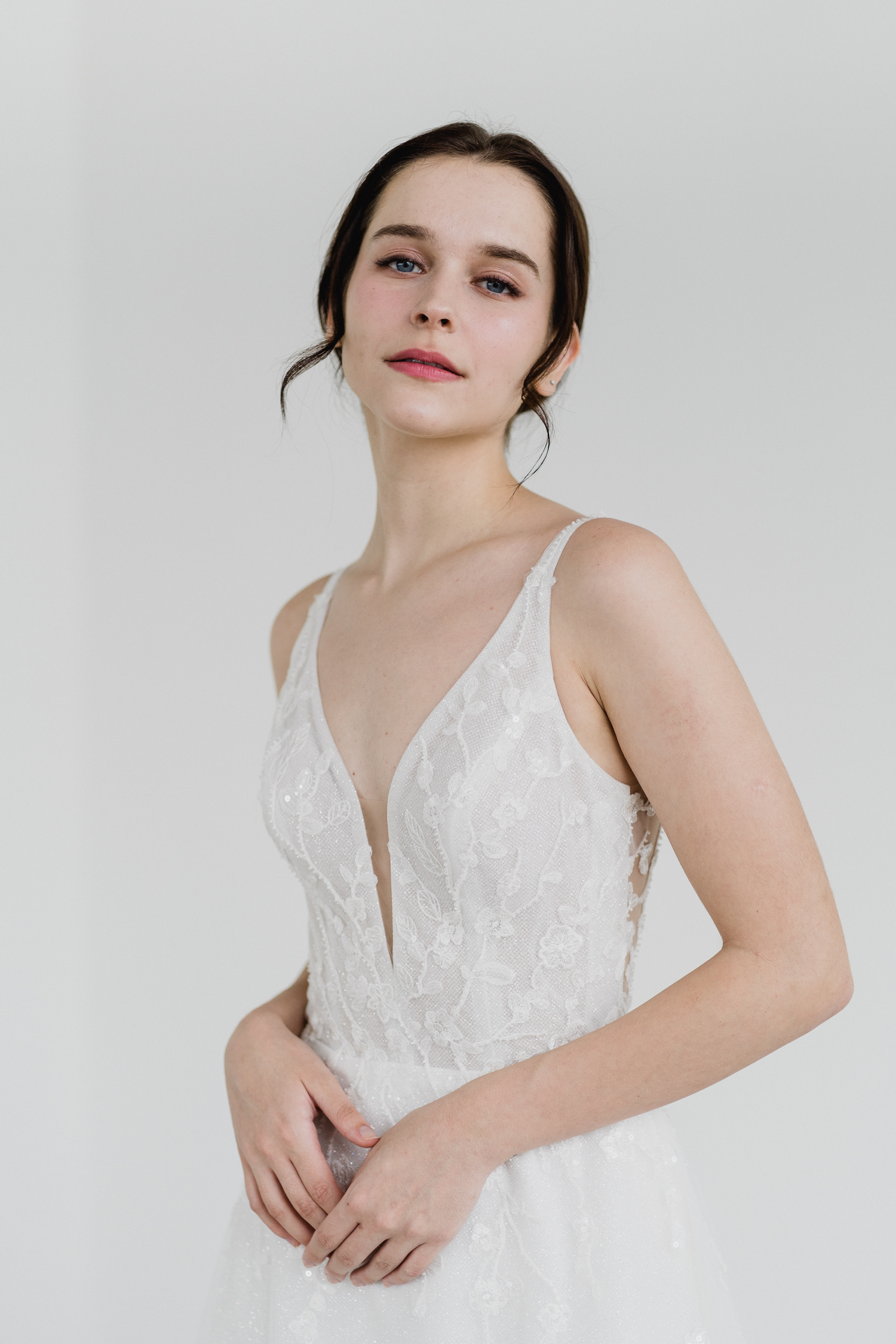 Reimi wedding gown front view with V-neckline and glitter tulle