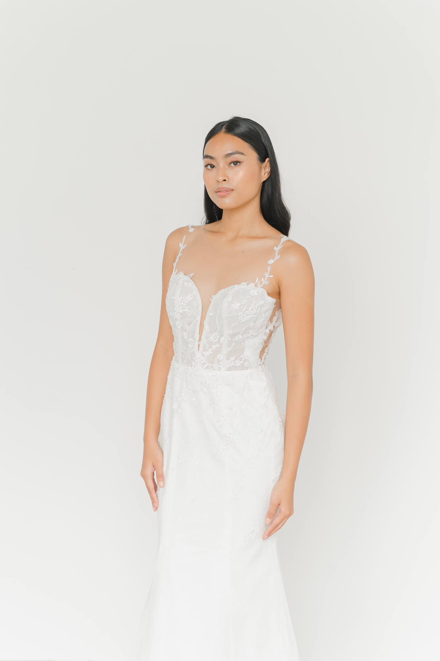 Rhea wedding dress featuring lace straps and a romantic mermaid silhouette