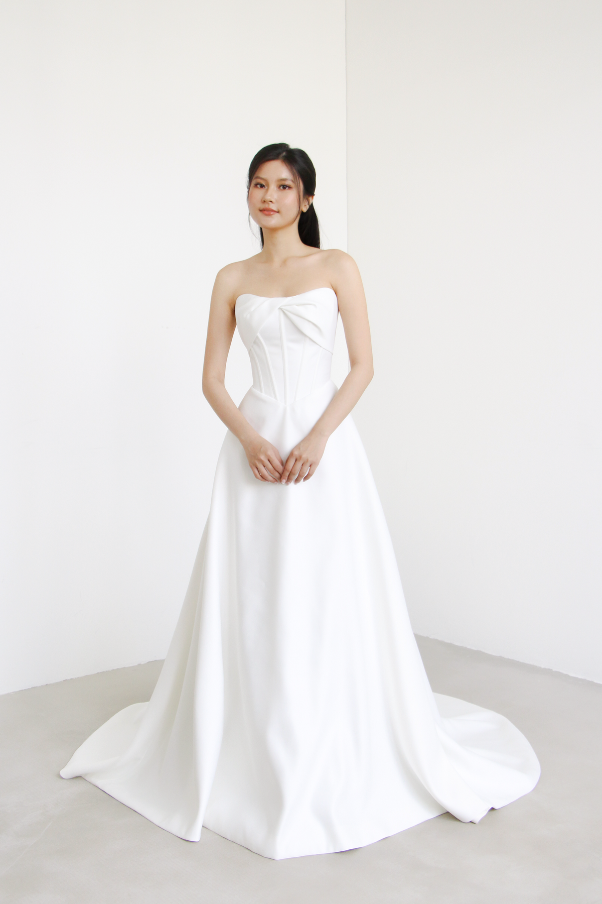 Rosalie wedding dress front view with a sweetheart neckline and sculpted basque waist