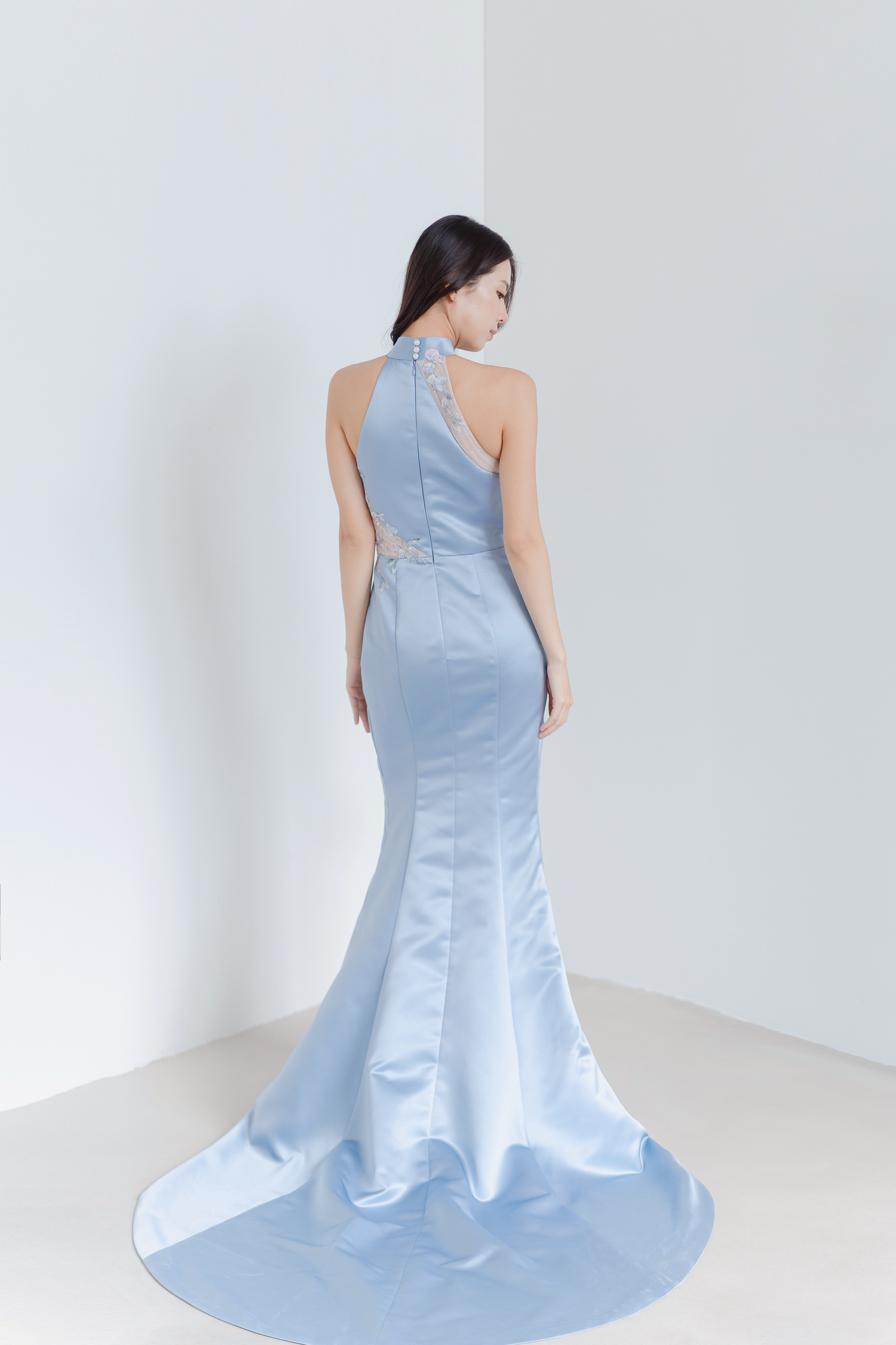 Ryo wedding cheongsam train showcasing delicate lace detailing and a graceful flowing train
