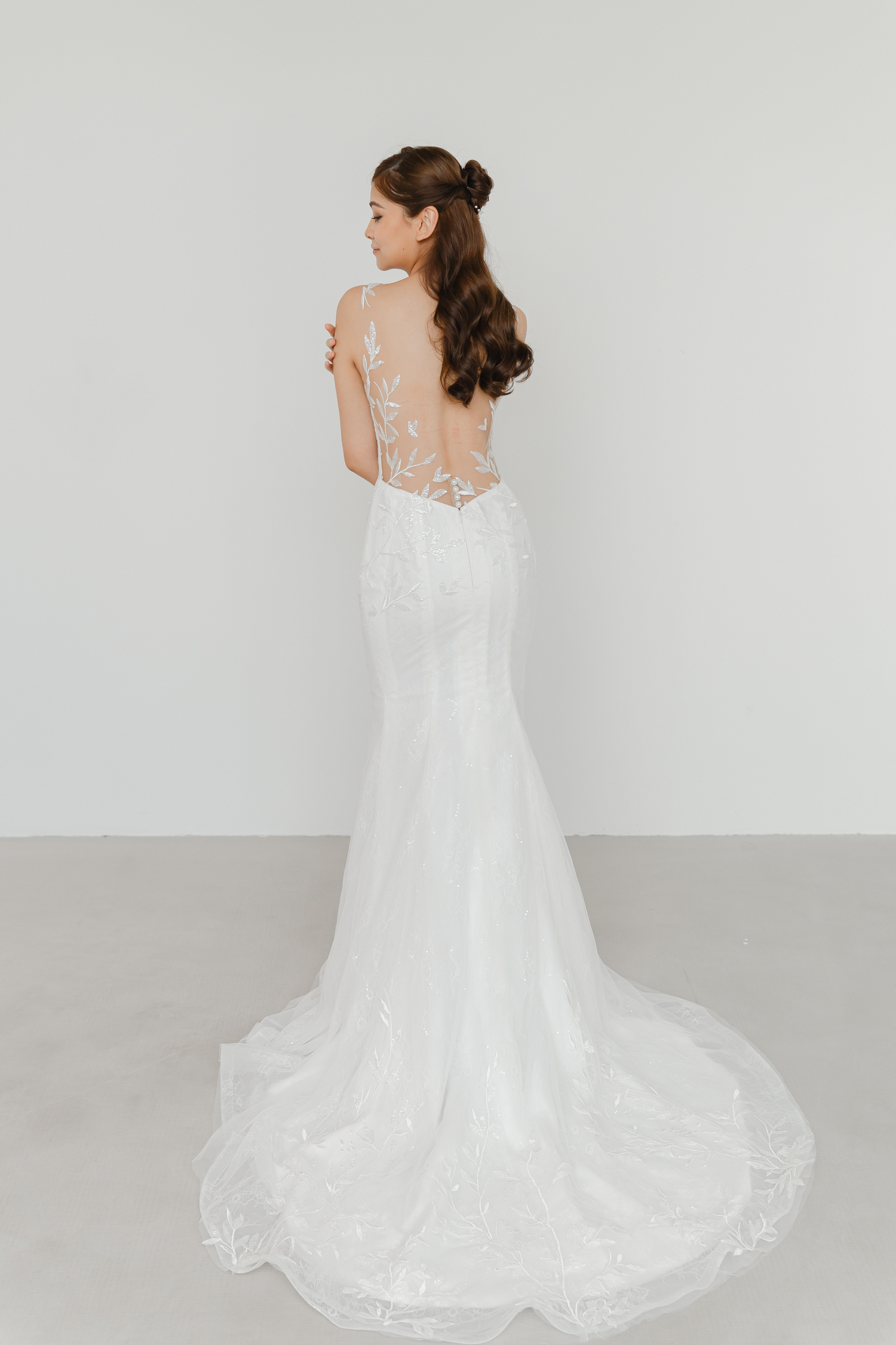 Sally bridal gown back view with a low back design