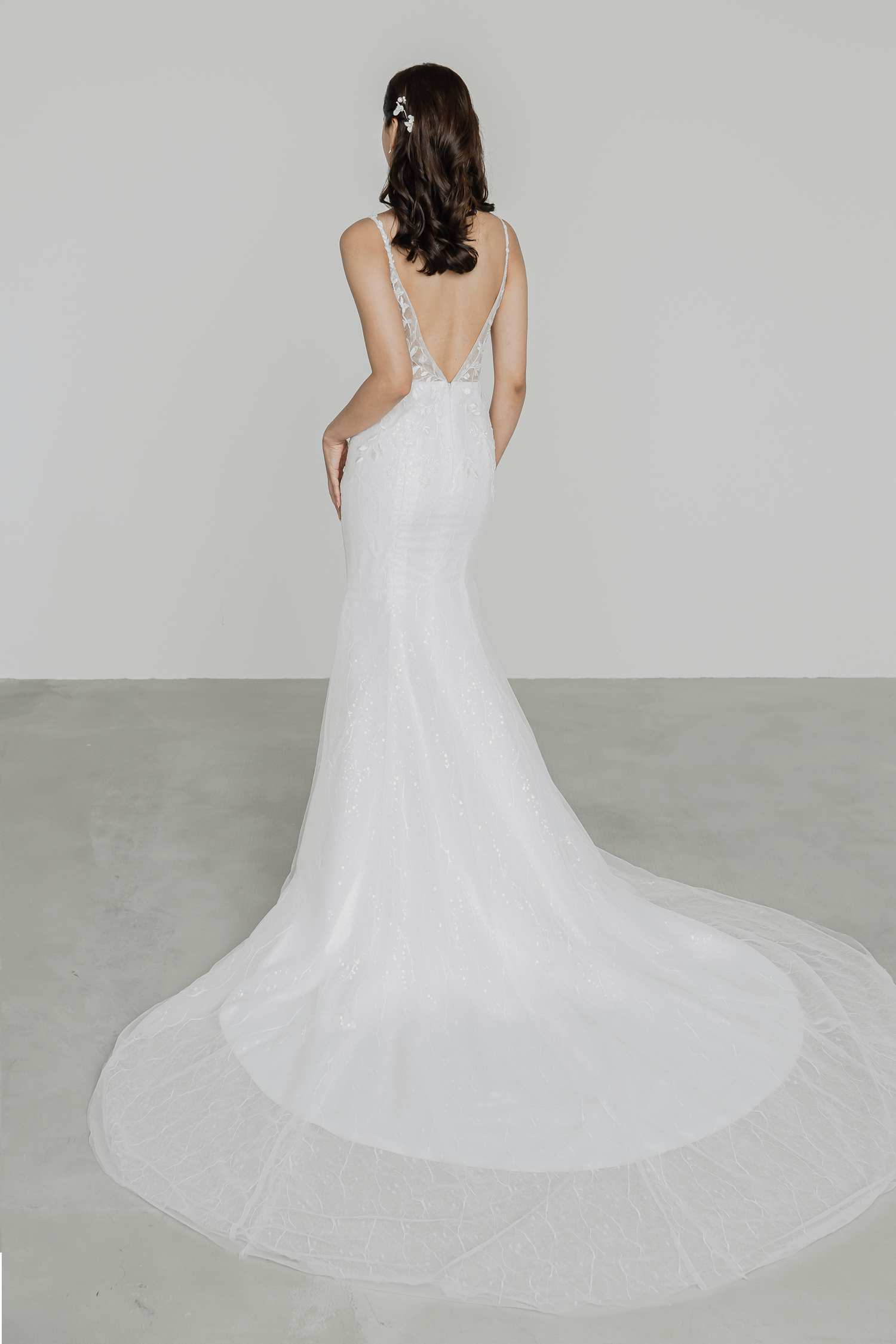 Close-up of Sammi bridal gown with shimmering sequinned tulle layers
