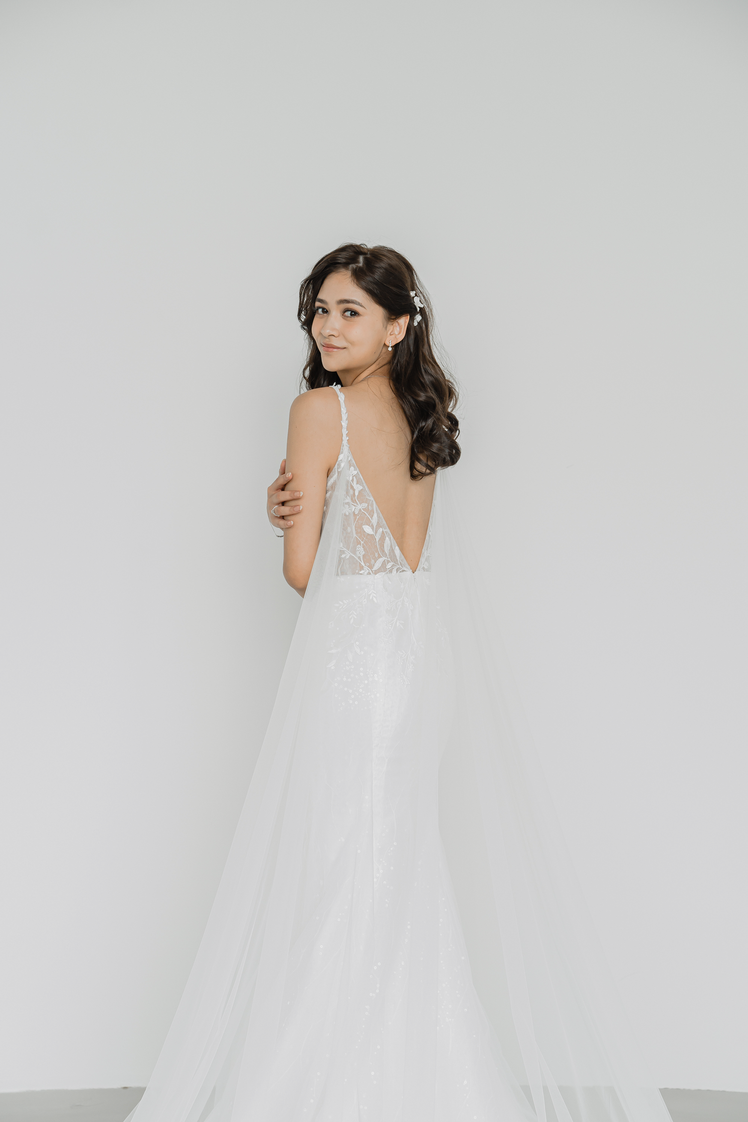 Close-up of Sammi wedding gown showcasing the detachable tulle wings