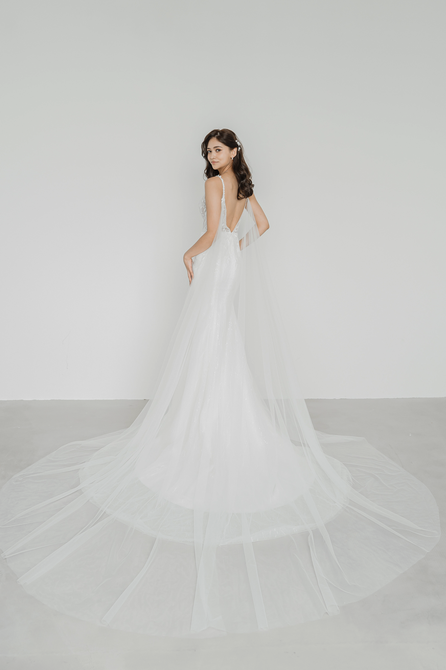 Sammi wedding gown styled with detachable tulle wings