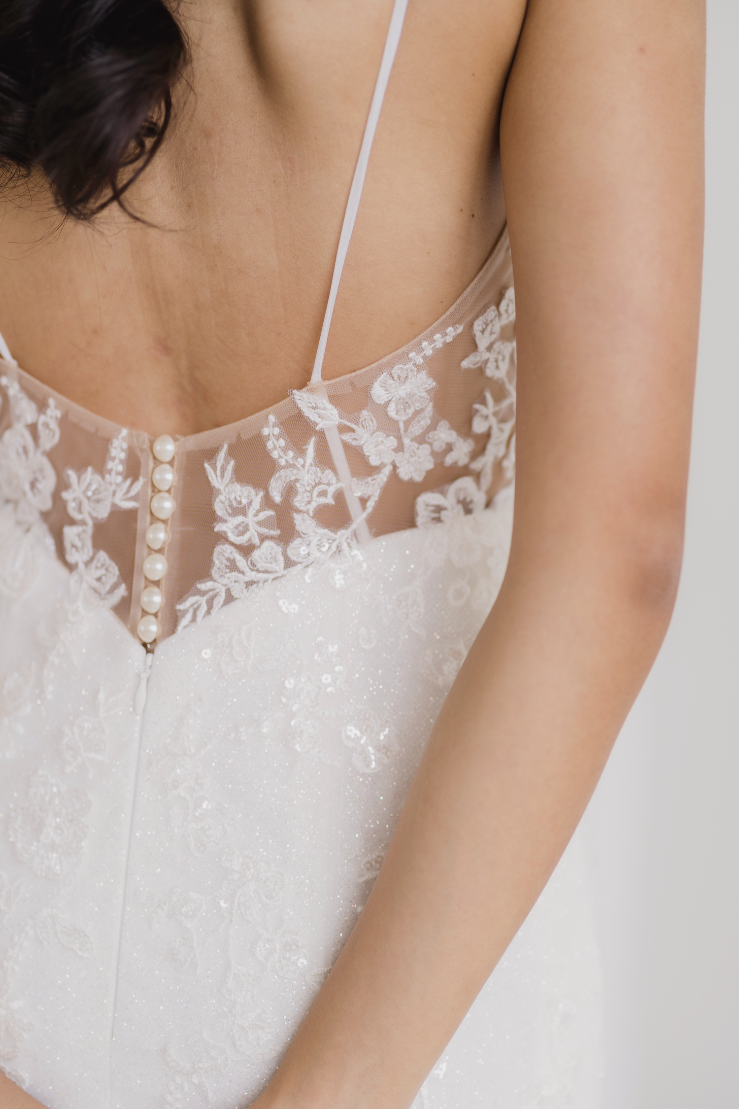 Close-up of Selina bridal gown with shimmering glitter tulle