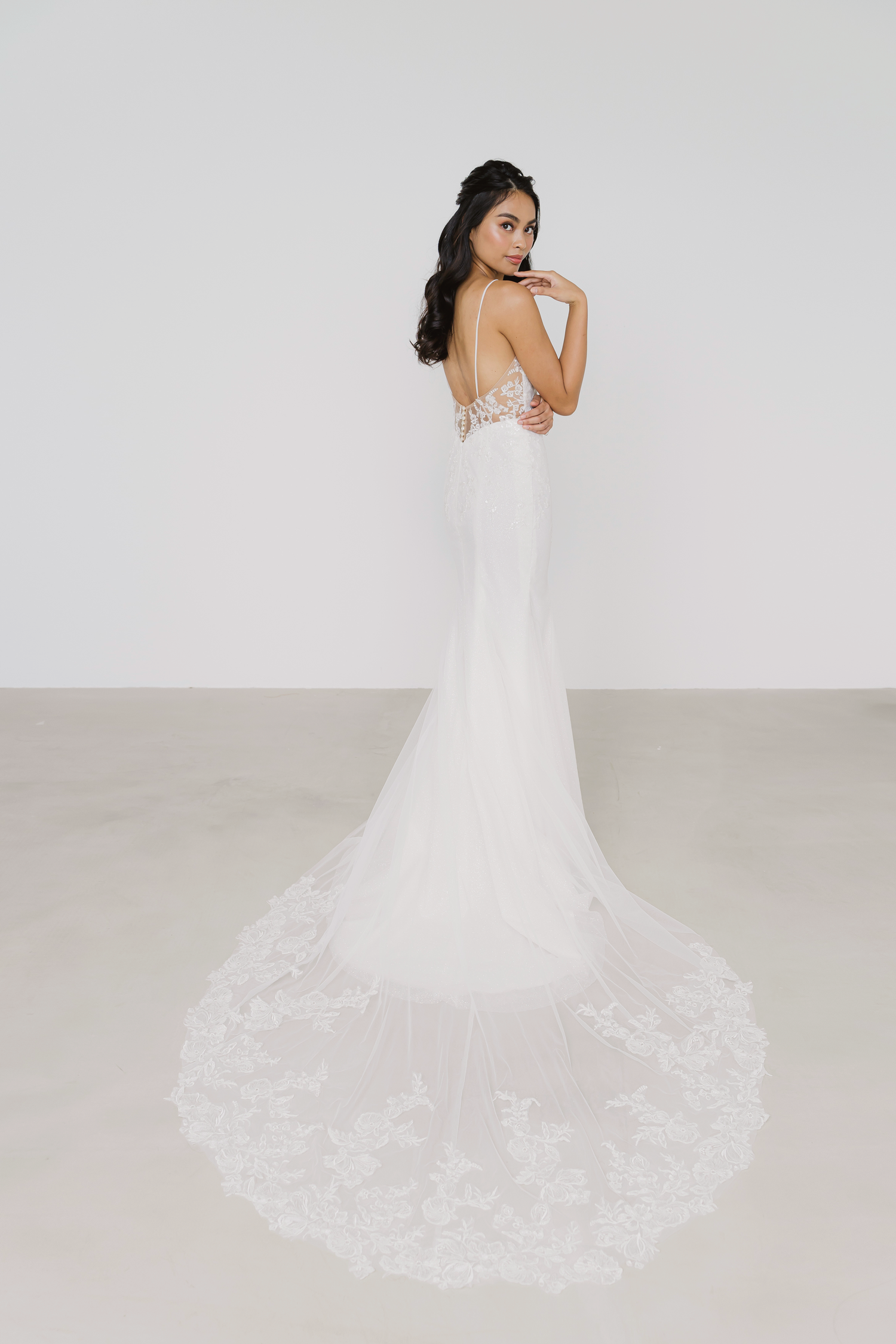 Selina wedding dress side view with a flowing silhouette