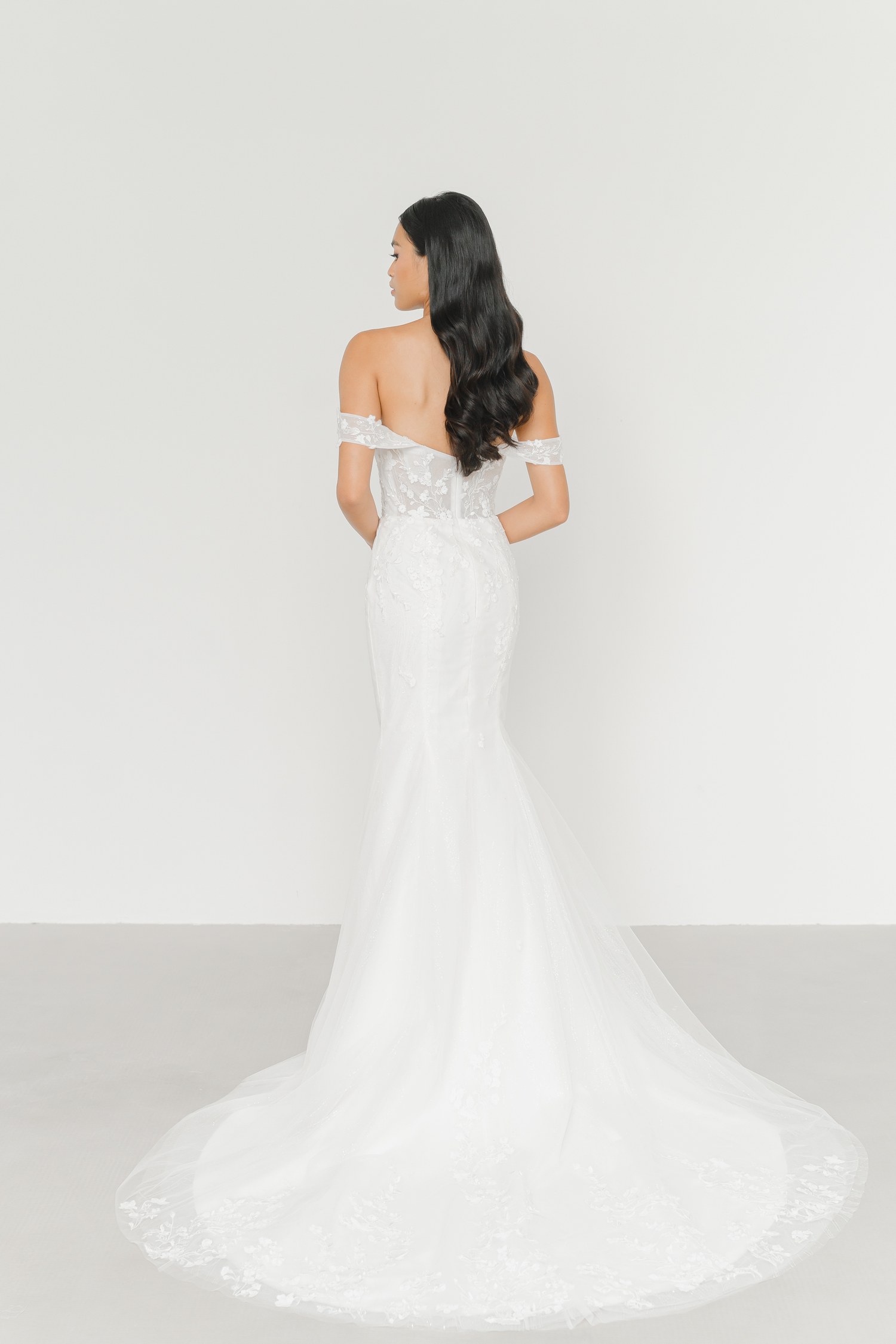 Shanice bridal gown back view with intricate floral lace detailing