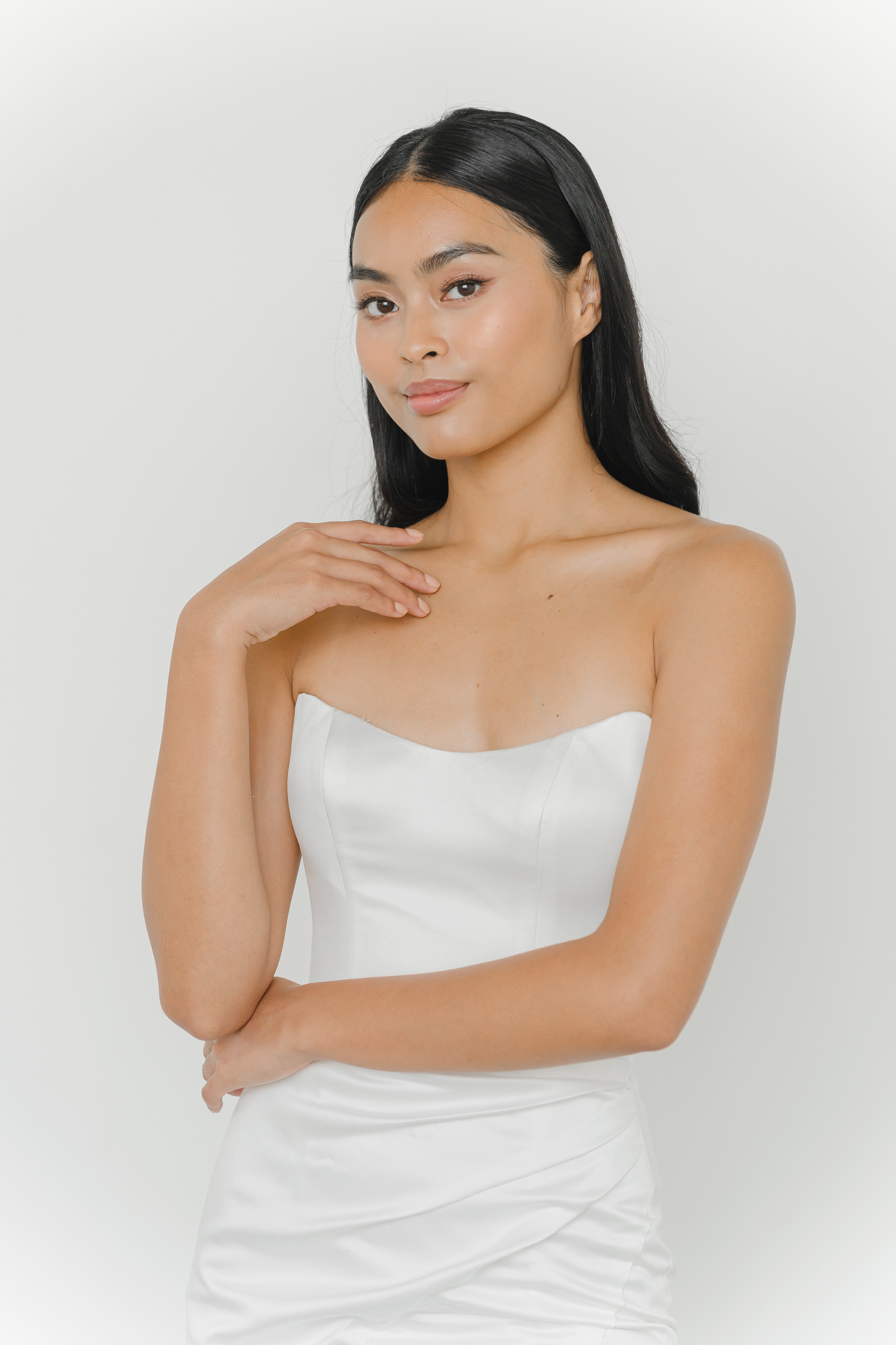 Shanna bridal evening gown front view with a scoop neckline and minimalist silhouette