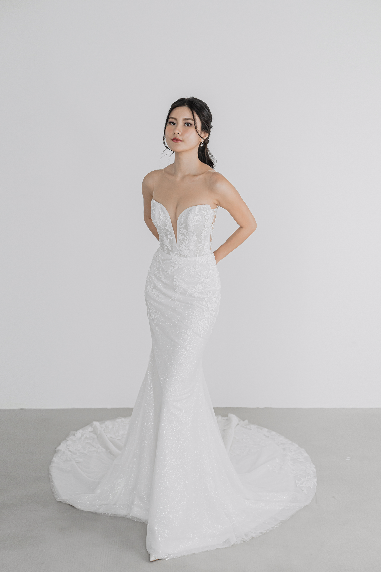 Sheila bridal gown featuring delicate beaded lace appliqués and shimmering glitter tulle