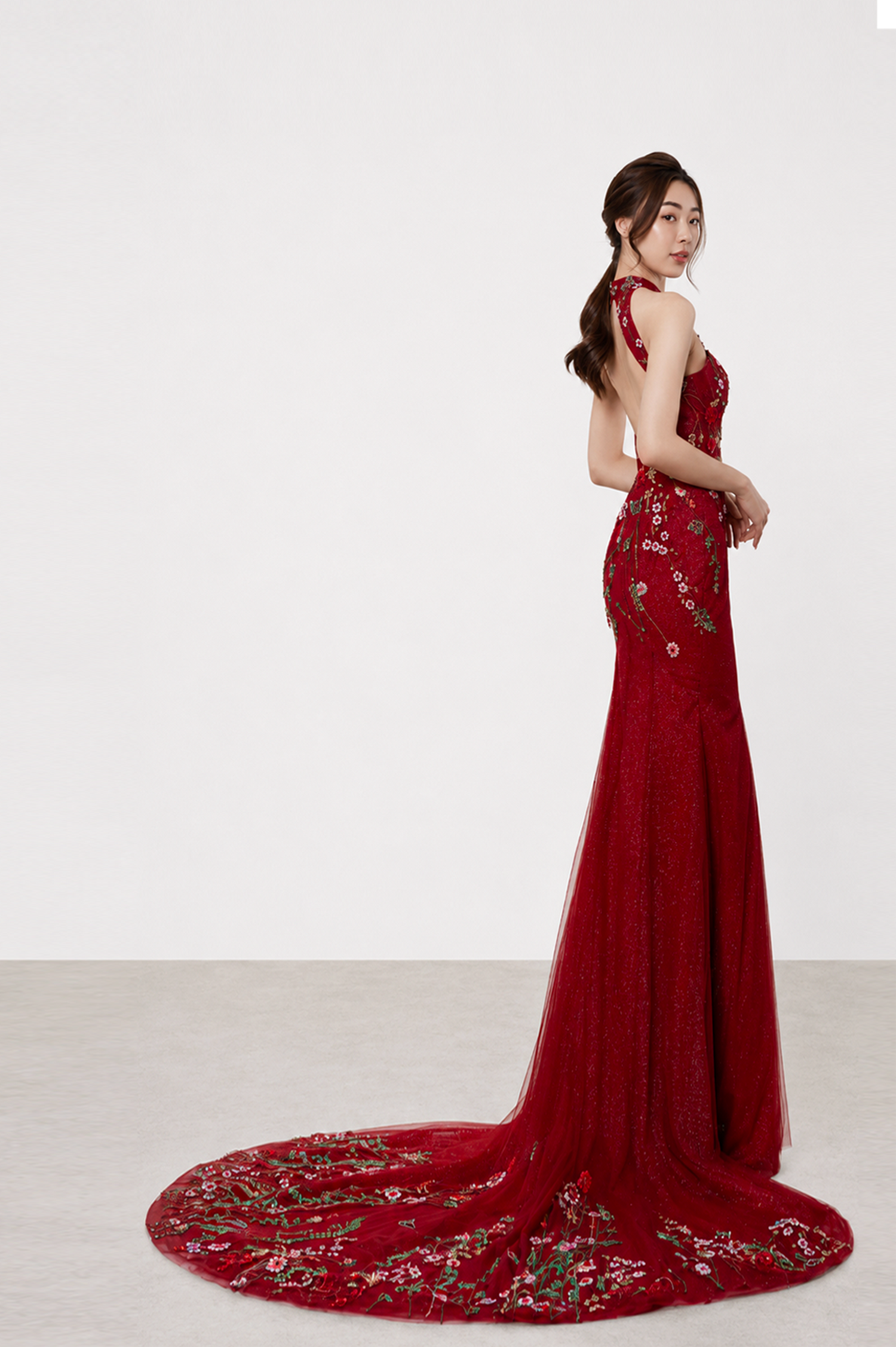 Sora wedding cheongsam back view showcasing the elegant silhouette and lace detailing