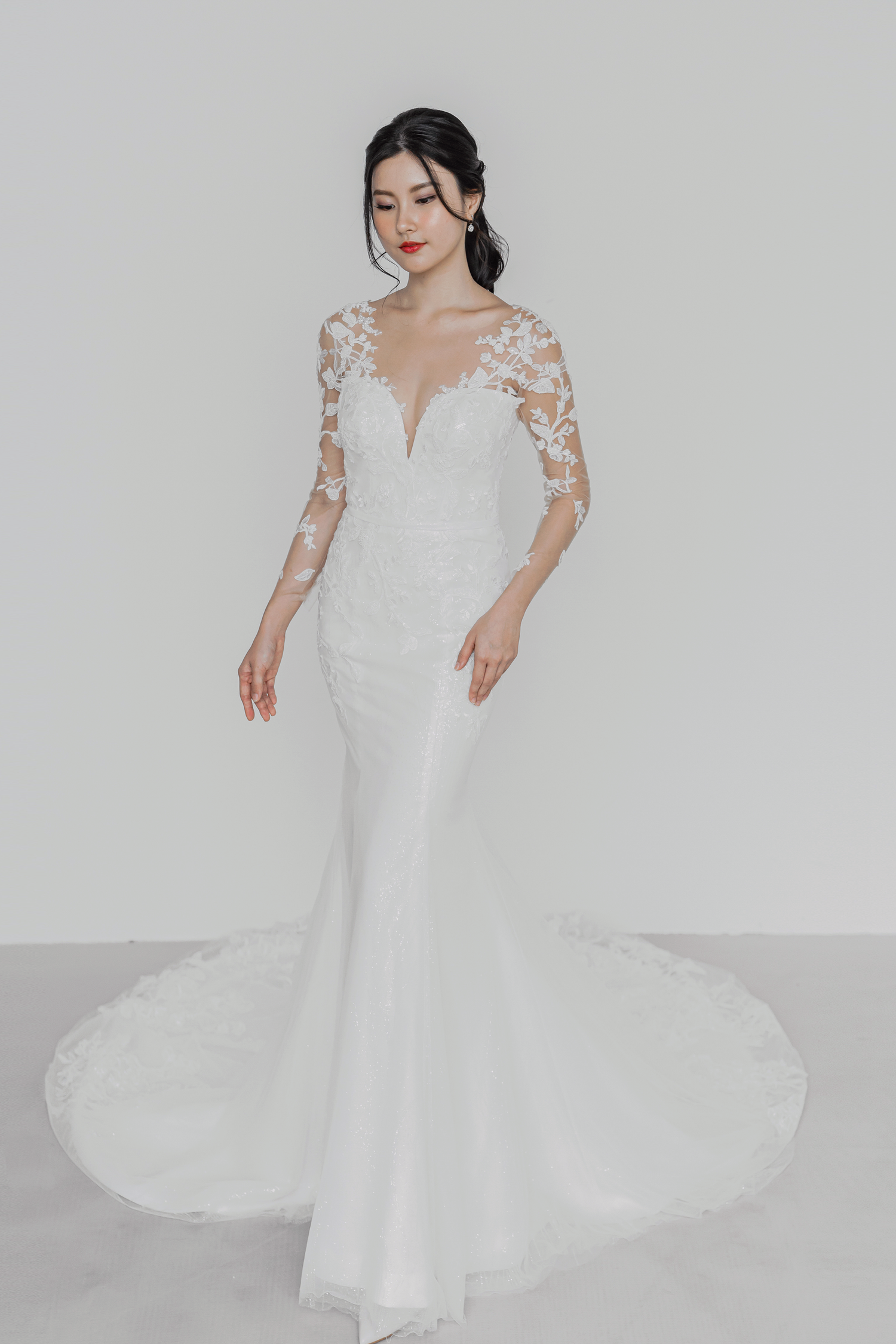 Stefani bridal gown featuring delicate beaded lace detailing and a fitted silhouette