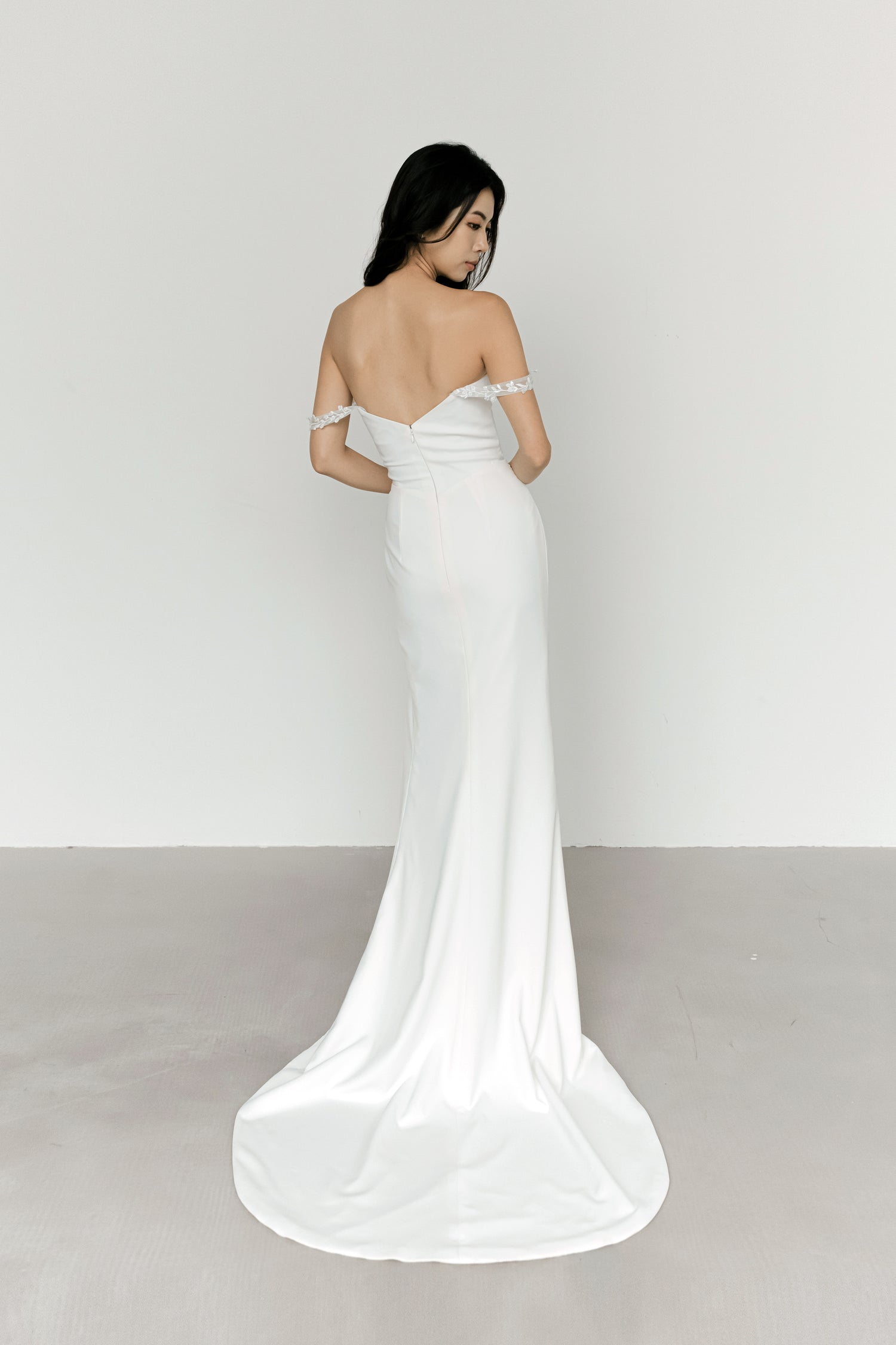 Sybil evening dress back view with an elegant fitted silhouette