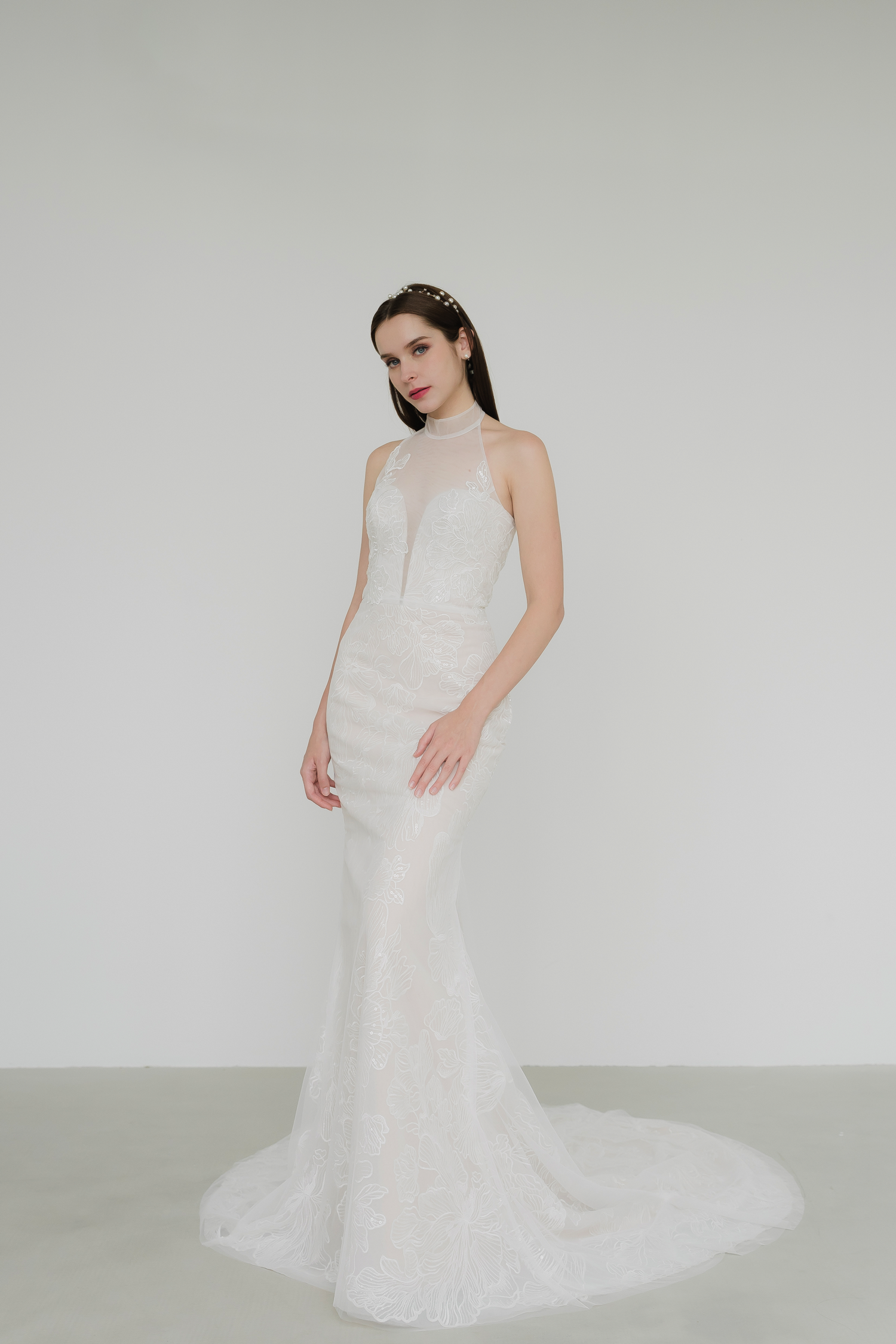 Taylor wedding gown side view with a flattering fitted silhouette