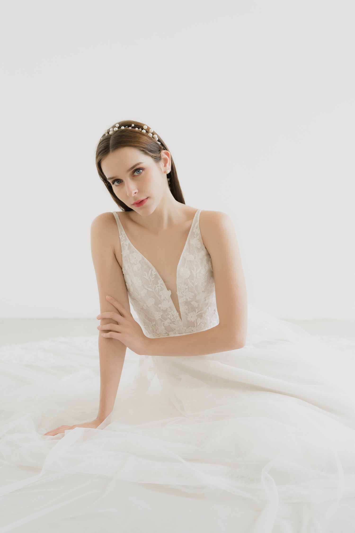 Tena bridal gown front view with a flattering V-neckline and romantic A-line silhouette
