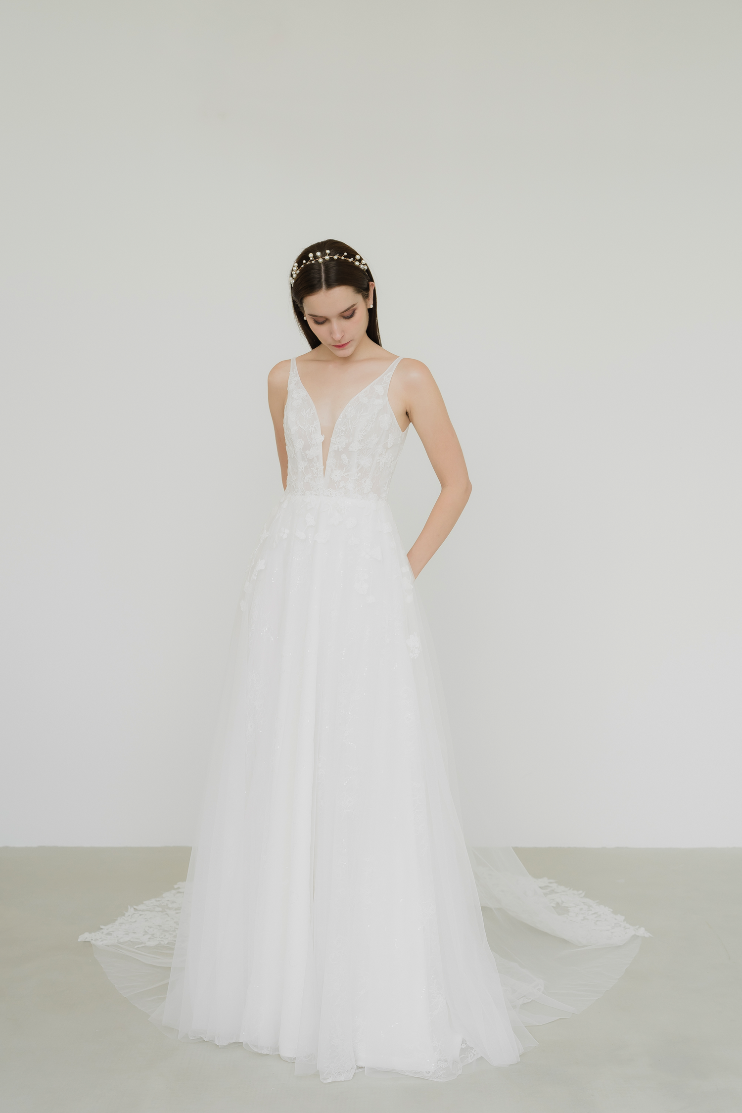 Tena bridal gown front view with a flattering V-neckline and romantic A-line silhouette